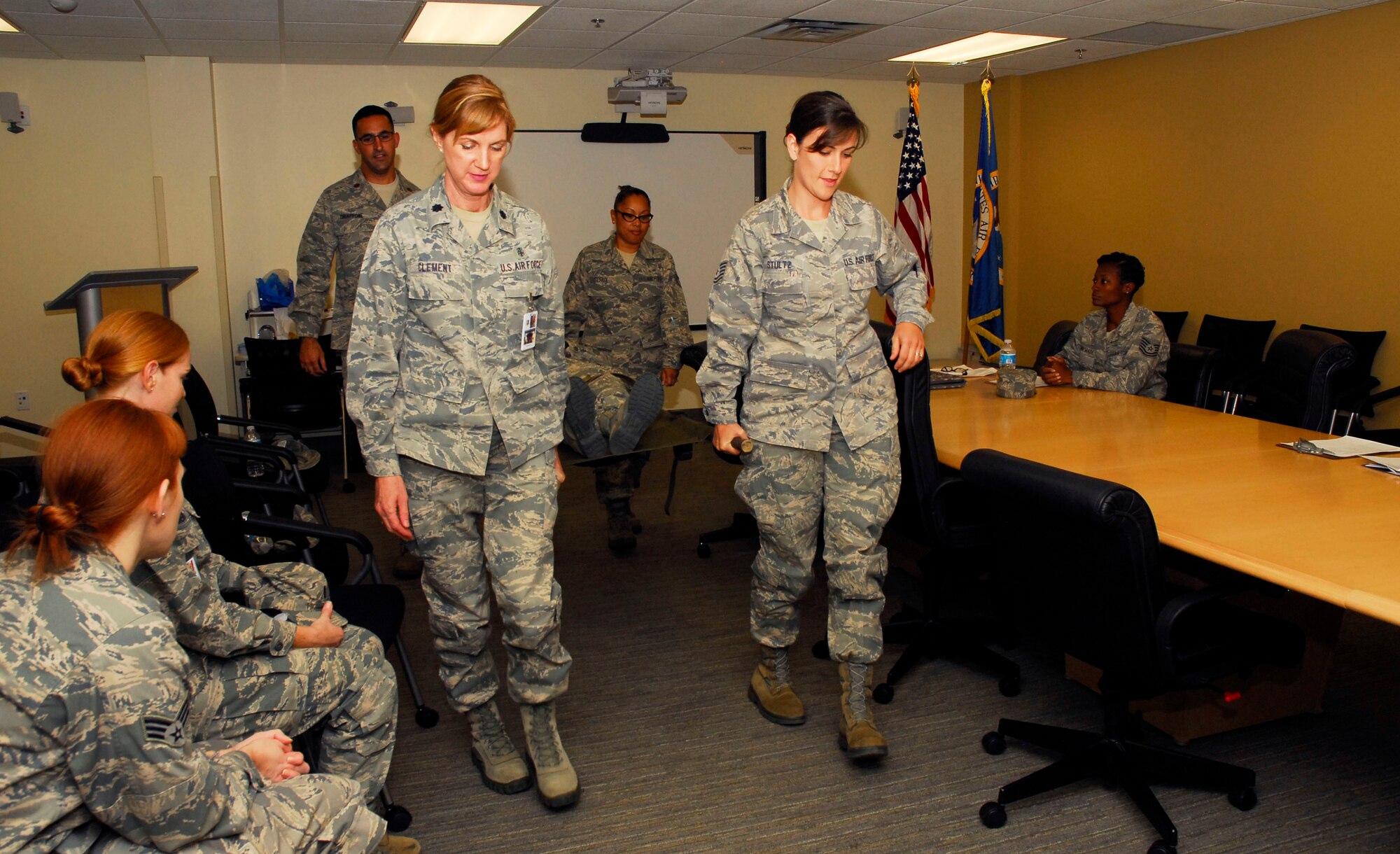 Maj. Vincent Chiappone, Staff. Sgt. Joy Ottrix, Lt. Col. Julie Clement, and Tech. Sgt. Amy Stultz all of the 940th Wing Aero Medical Squadron practice using a litter during an active shooter training exercise at Beale Air Force Base, Calif. The training, held during the September Unit Training Assembly, was part of their annual mass causality exercise to prepare AMDS Reservists to properly treat patients during an emergency event.  Clement said this training readies all career fields within the AMDS to work together during emergencies. “We need to make sure patients are treated during the golden hour and receive the proper care,” said Clement.  (U.S. Air Force photo/Tech. Sgt. Kenneth McCann) 
 
