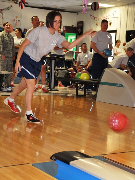 Senior Airman Hayley Lambert, 9th Communications Squadron, competes in the reverse-hand bowling portion of Beale Air Force Base's annual sports day Oct. 5. (U.S. Air Force photo by Tech. Sgt. Eric Petosky/Released) 
