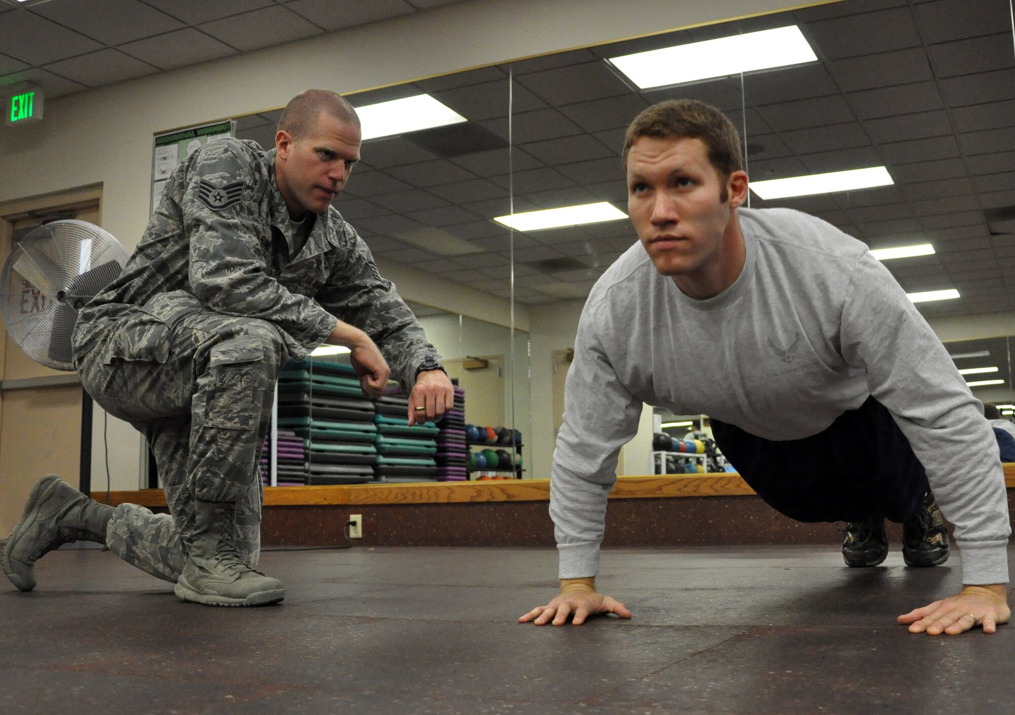 Tech. Sgt. Donnie Short, 548th Operations Support Squadron, competes in the pushup portion of Beale Air Force Base's annual sports day Oct. 5. (U.S. Air Force photo by Tech. Sgt. Eric Petosky/Released) 