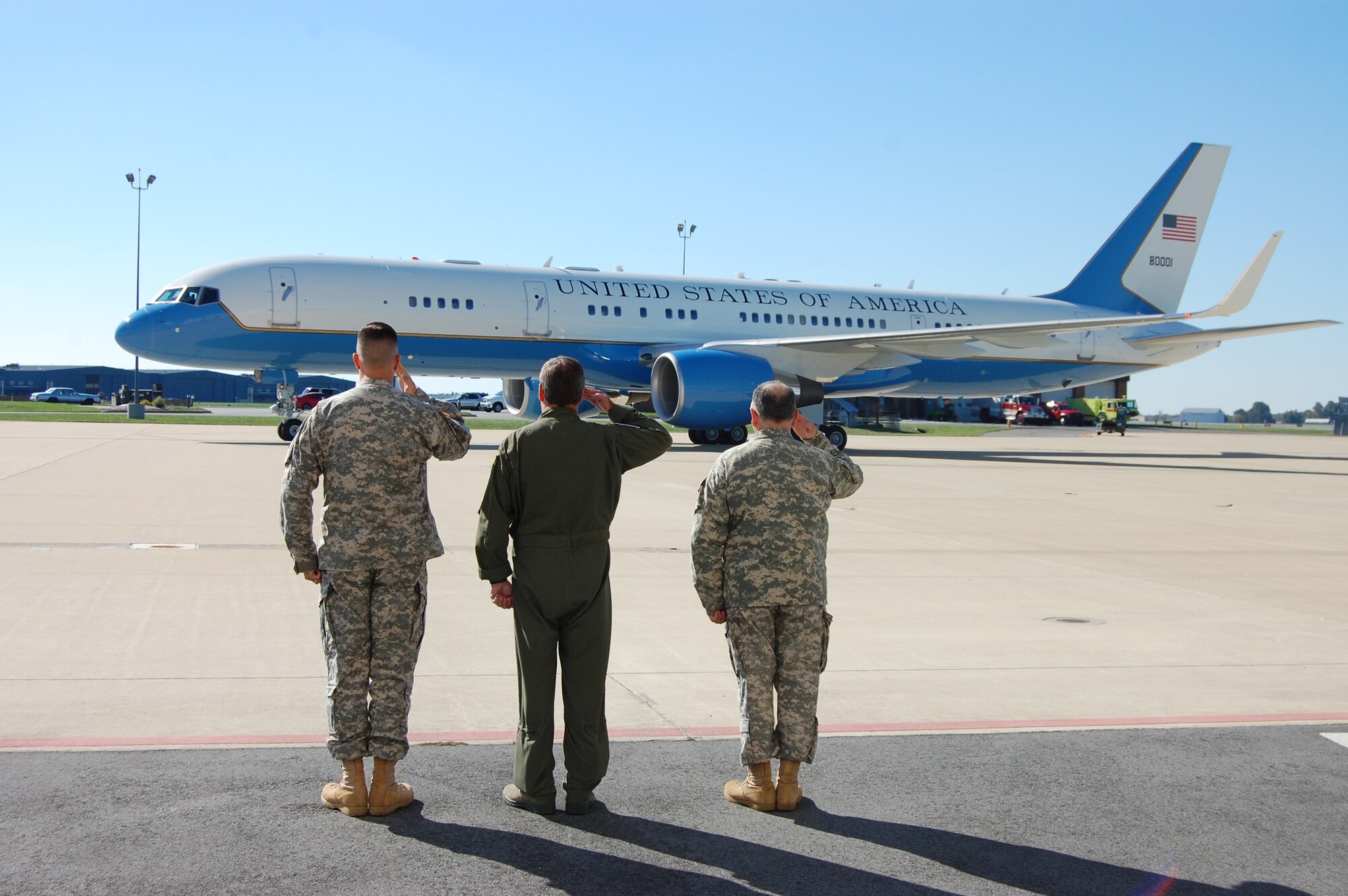 Major Jeff Stowell, executive officer to the Adjutant General, Delaware National Guard, Col. Mike Feeley, commander, 166th Airlift Wing, Delaware Air National Guard, and Maj. Gen. Frank D. Vavala, The Adjutant General, Delaware National Guard, salute Air Force Two as the aircraft carrying Vice President Joe Biden prepares for takeoff at the New Castle Air National Guard Base, Delaware on October 11, 2012 for a flight to Lexington Blue Grass Airport, in Lexington, Ky., for tonight’s vice presidential debate in nearby Danville, Ky. (U.S. Air Force photo/Tech. Sgt. Benjamin Matwey)