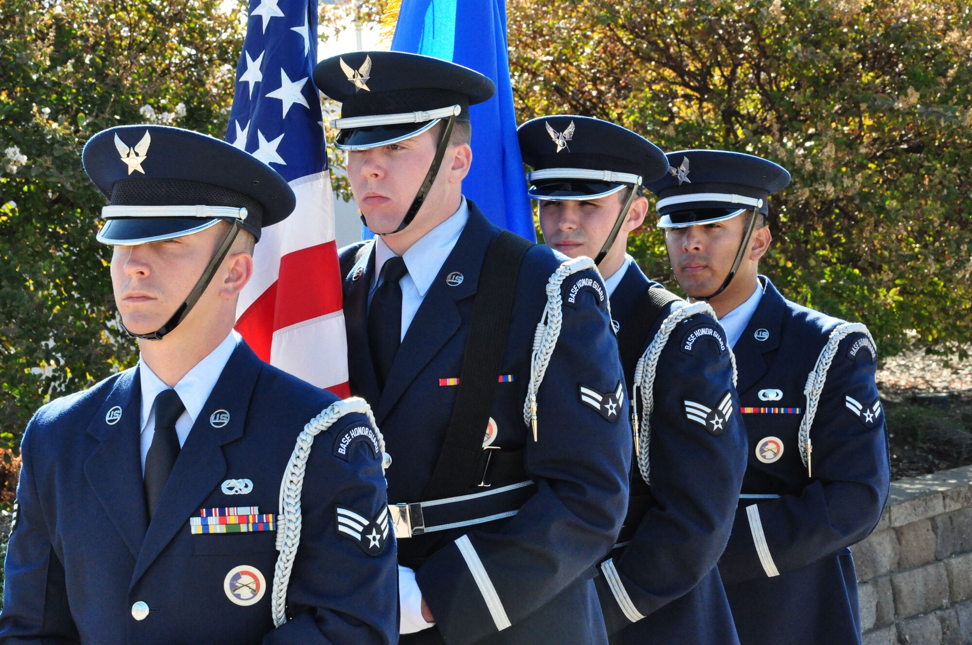 The Beale Air Force Base Honor Guard prepares to post the colors during an enlistment ceremony at Heritage Park Oct. 8. Maj. Gen. (ret) Charles "Chuck" Yeager administered the oath of enlistment to future members of the Air Force Reserve. Yeager was the first man to break the sound barrier in 1947. After administering the oath of enlistment he offered advice to the future Airmen as they begin or continue their careers as Reservists. (U.S. Air Force photo by Tech. Sgt. Eric Petosky/Released)