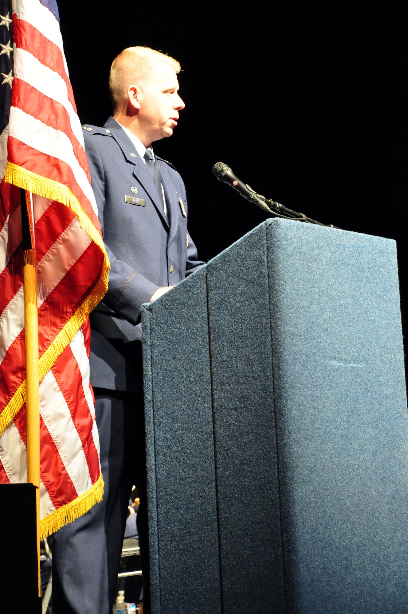 Col. Jason Green, 9th Mission Support Group commander, delivers the opening remarks prior to a concert perfomance by the Air Force Band of the Golden West at the Sacramento Community Center Theater Oct. 9. (U.S. Air Force photo by Tech. Sgt. Eric Petosky/Released)