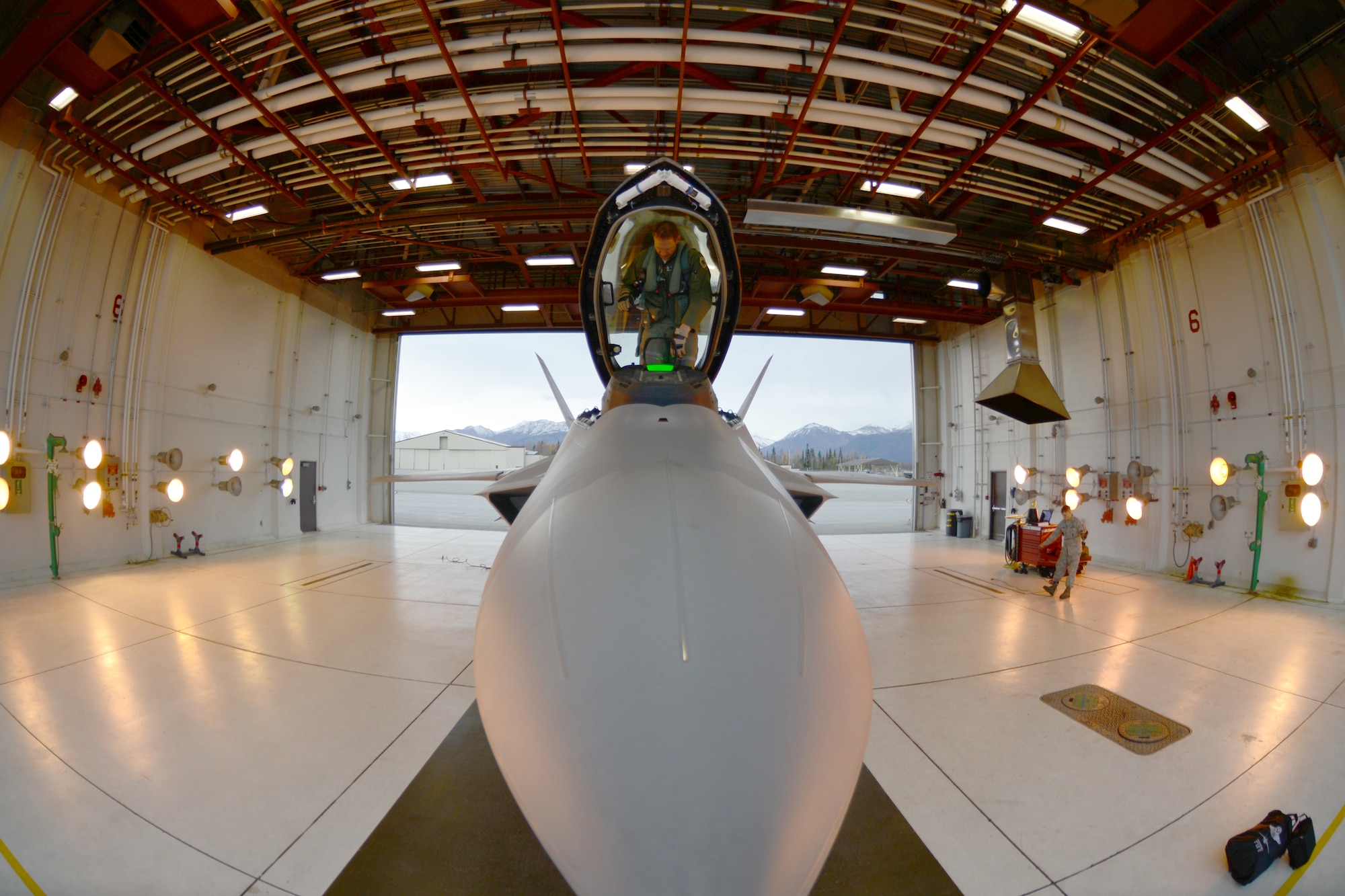 Lt. Col. David Piffareio, 302nd Fighter Squadron commander, steps out of the 302nd FS flagship F-22, Aircraft 05-4102. The 302nd FS flagship is now back in Alaska after getting a tune up at the depot facilities at Hill Air Force Base, Utah (U.S. Air Force Reserve Photo/Tech. Sgt. Dana Rosso)