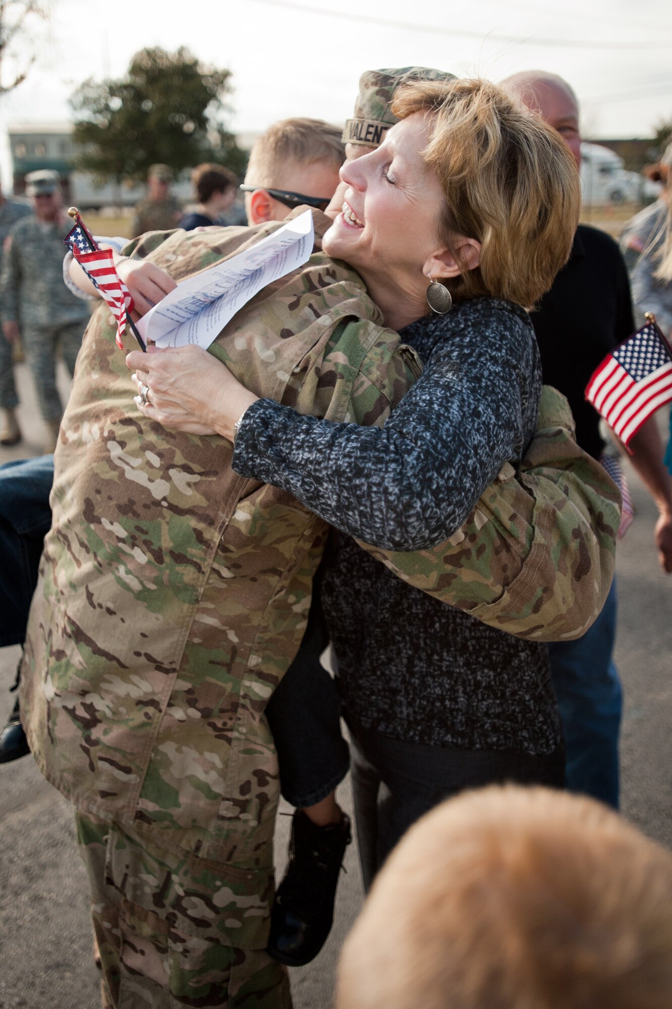 Judy Tabor hugs her son-in-law, Staff Sgt. Jeff Valentine, during a welcome-home ceremony held Feb 28, 2012, at the Kentucky Air National Guard Base in Louisville, Ky. Valentine was one of 58 Kentucky Army and Air National Guard Soldiers and Airmen who have been deployed to Afghanistan for the past nine months as part of the Kentucky National Guard's Agribusiness Development Team 3. The team???s mission was to help Afghan farmers develop sustainable agriculture. Its members were instrumental in coordinating the first-ever commercial mulberry harvest in the Panshir Valley, producing 75 metric tons of mulberries and netting $45,000 for local farmers. (U.S. Air Force photo by Maj. Dale Greer)