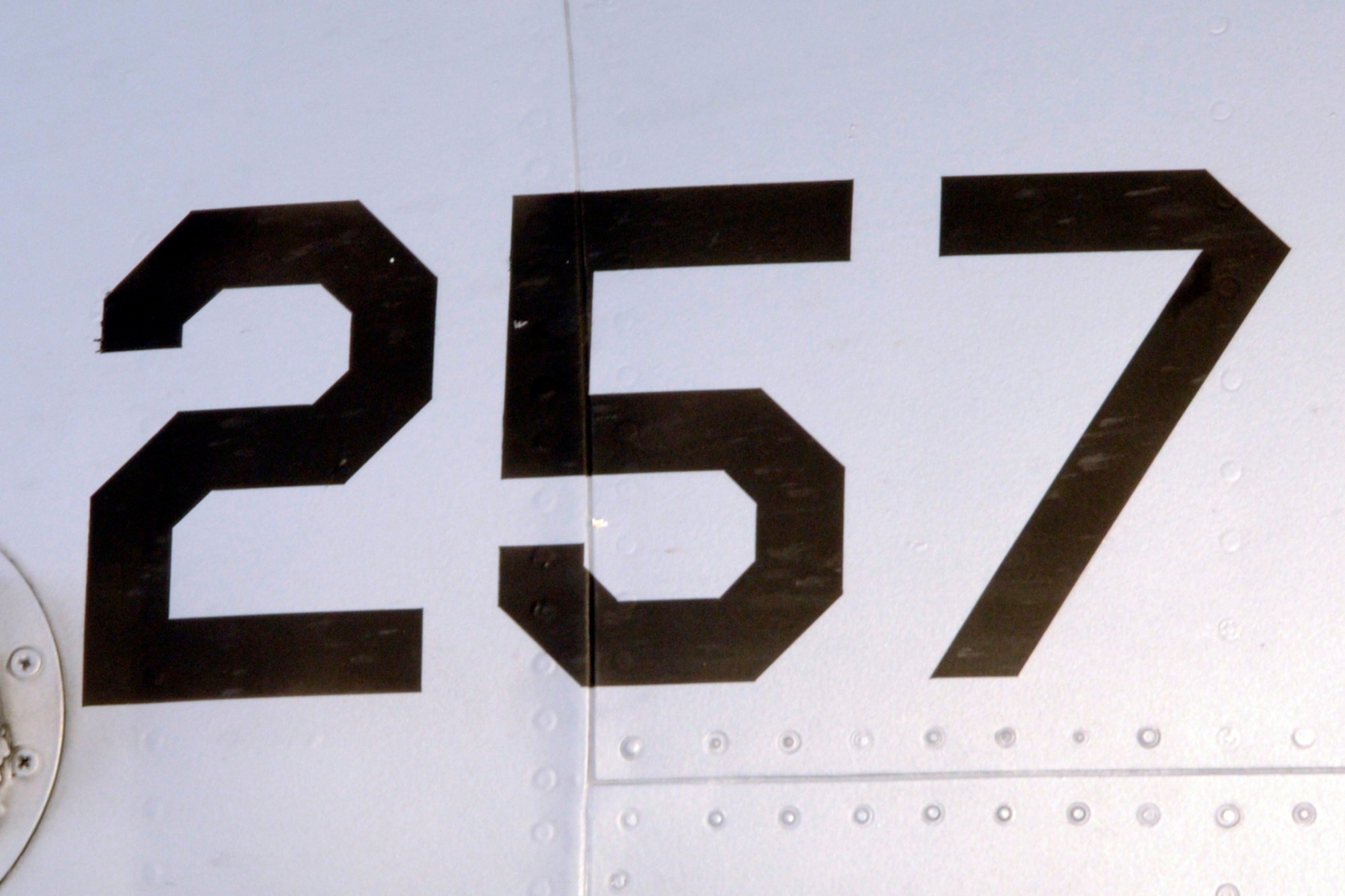 In addition to various unit markings, all military aircraft feature the aircraft’s tail number in several prominent locations, such as the 257 seen on this A-10 Thunderbolt II at Selfridge Air National Guard Base, Mich. The tail number is unique to each aircraft and allows each aircraft to be tracked by maintenance and other personnel. (Air National Guard photo by Brittani Baisden)