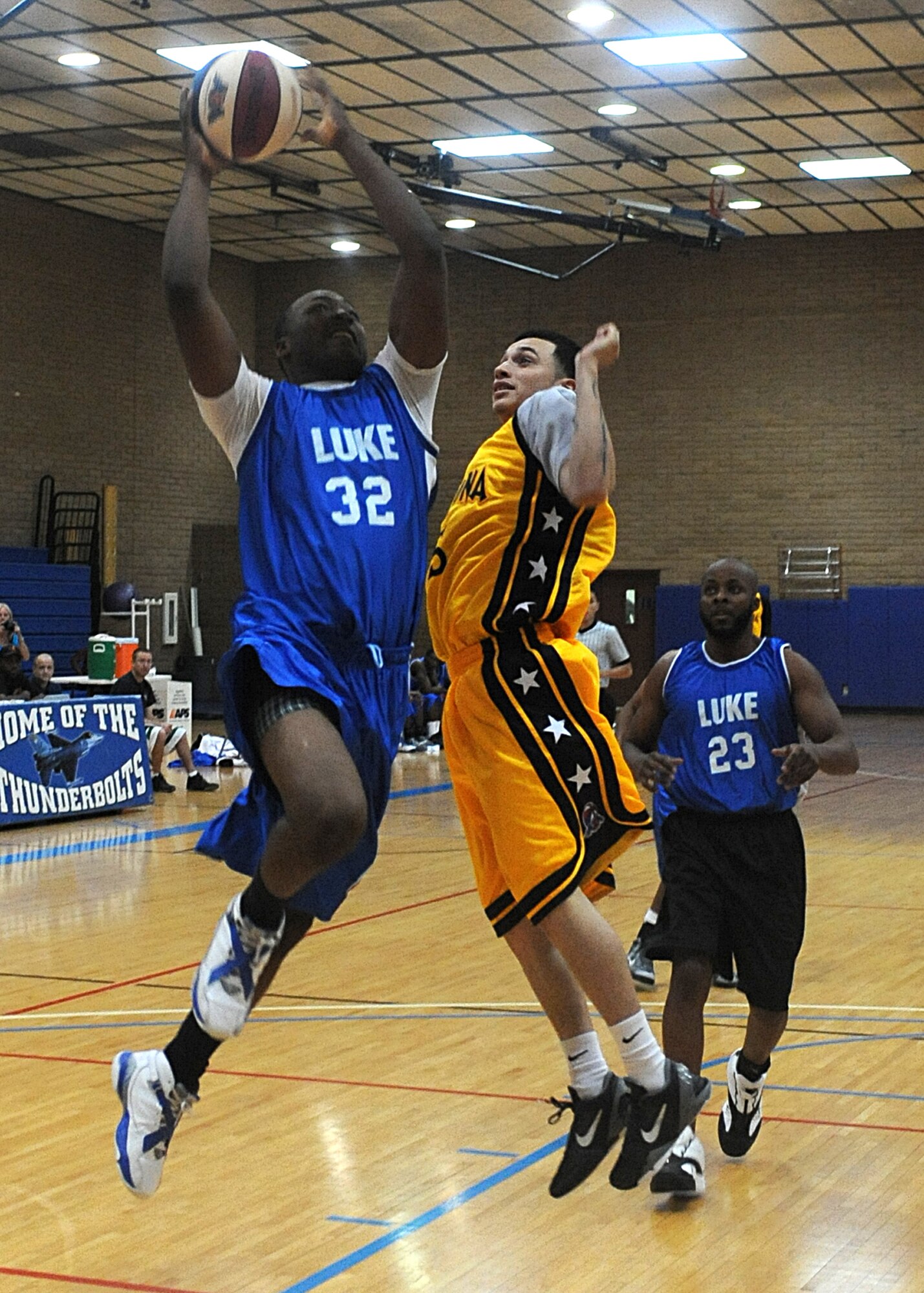 Anthony Coleman, 56th Civil Engineer Squadron, attempts a lay-up in a game against the Arizona Scorpions Oct. 06, 2012 at the Bryant Fitness Center on Luke Air Force Base, Ariz., Coleman scored eight points in the game. (U.S. Air Force photo by Airman 1st Class Devante Williams)