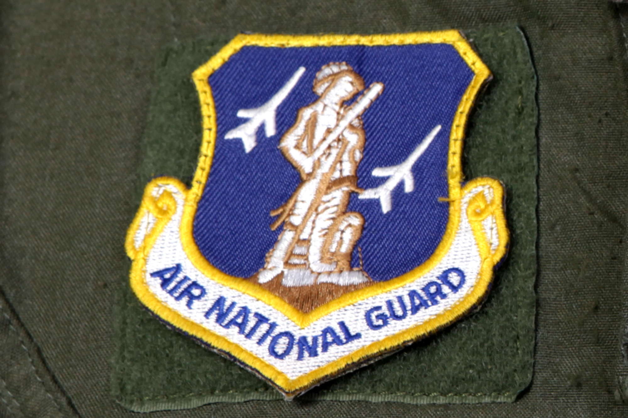 The Air National Guard patch is one of several patches worn by the pilots of the 107th Fighter Squadron, which is a component of the 127th Wing of the Michigan Air National Guard. Unit patches and aircraft insignia help build unit esprit de corps. (Air National Guard photo by Brittani Baisden)