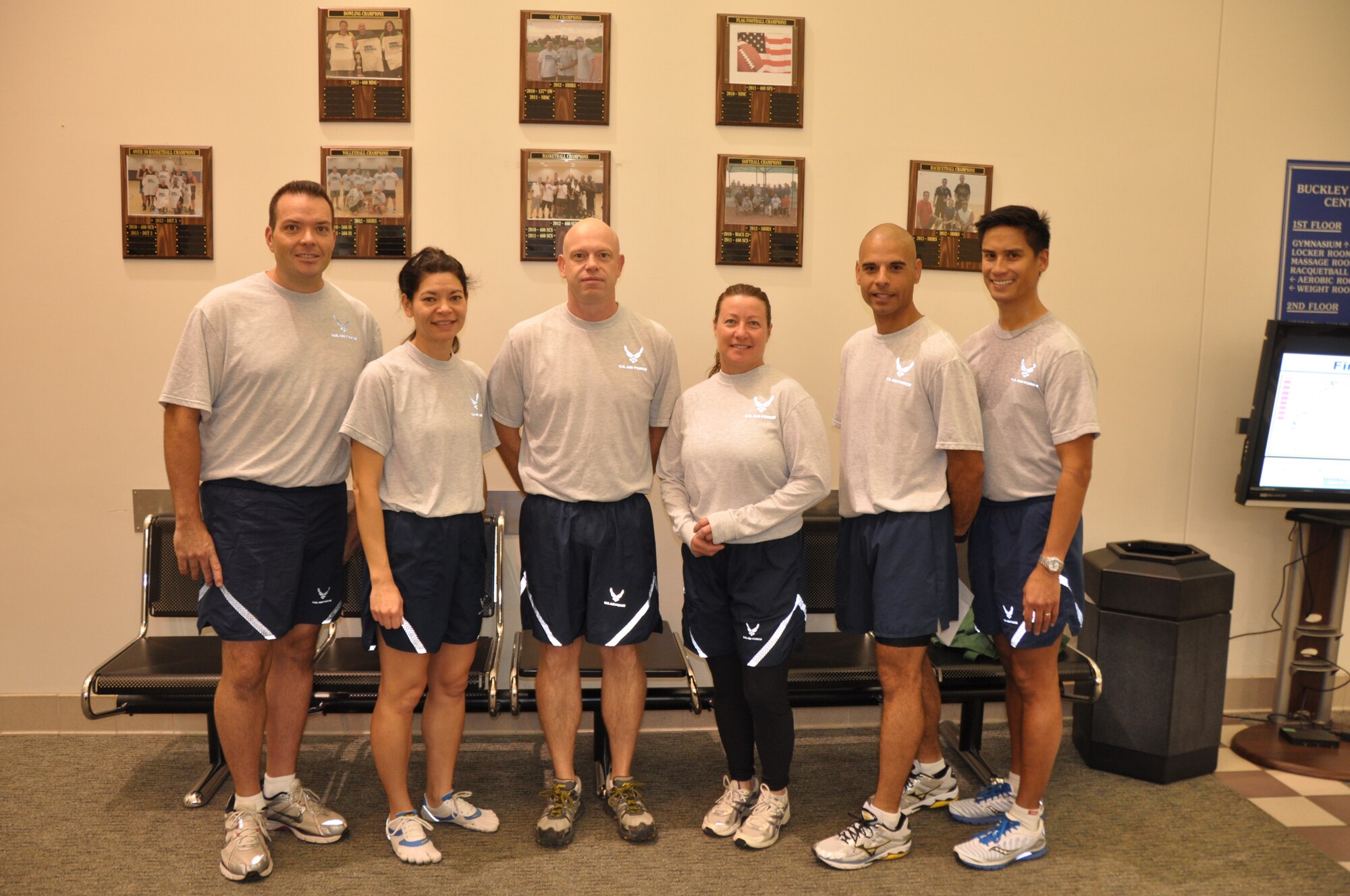 Fourteen members, including two spouses, from the Air Reserve Personnel Center participated or volunteered in the Sports Authority Rock 'n' Roll Denver Marathon, half marathon, relay and inaugural 22-mile bike tour Sept. 22, 2014. Participants were: Tech Sgt. Rob Hazelett, Lt. Col. Belinda Petersen, Master Sgt. Michael Moore, Maj. Susan Murphy, Master Sgt. Manuel Zubia and Lt. Col. Michael Ortiz. (U.S. Air Force photo/Senior Airman Desirae Henderson)