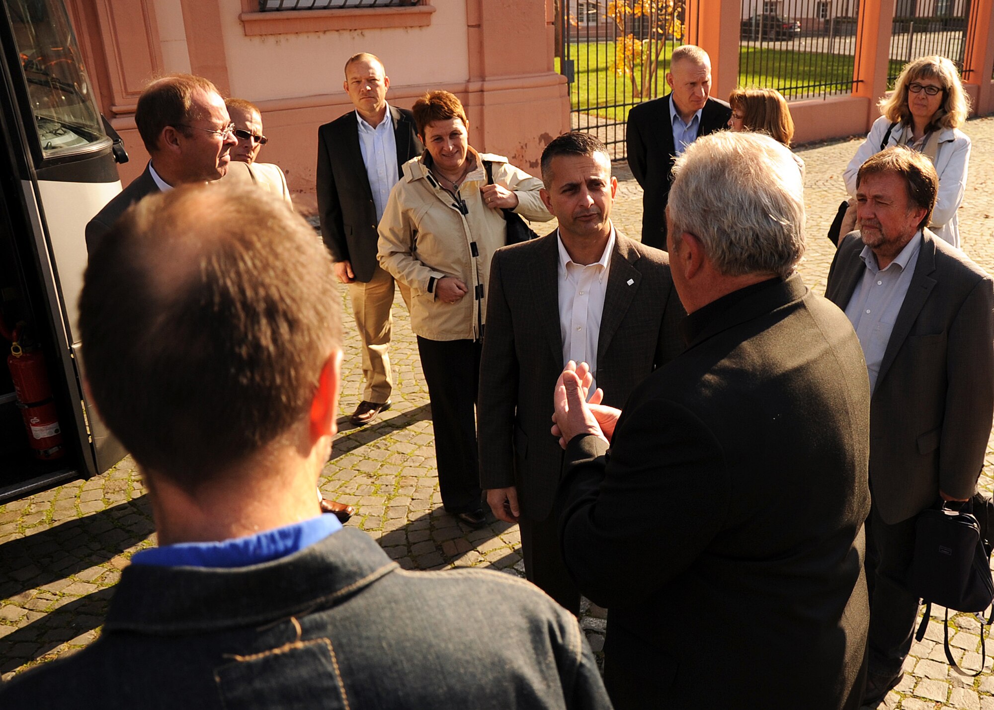 MAINZ, Germany – Michael Billen, center in black, Rheinland-Pfalz Parliament representative of the Bitburg-Pruem district, welcomes 52nd Fighter Wing leadership to the state parliament building here Oct. 10, 2012, for a familiarization tour of the city and a crash course in local German governance. Wing leadership and German government representatives of the communities surrounding Spangdahlem Air Base meet periodically to gain an understanding of each other’s priorities, vision and points of view. (U.S. Air Force photo by Staff Sgt. Daryl Knee/Released)