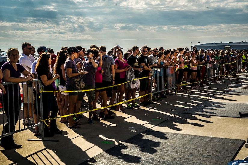 The crowd watches participants compete at Integrity’s Revenge Oct. 6, 2012, at the Charleston Maritime Center, Charleston, S.C. Several members from Joint Base Charleston competed in the CrossFit event, a two-day competition comprised of divisions that competed in certain exercises referred to as the Workout of the Day.  (U.S. Air Force photo/ Senior Airman Dennis Sloan)