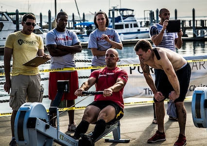 Tech. Sgt. Philip Vickery, 15th Airlift Squadron loadmaster, 437th Airlift Wing, performs rows Oct. 6, 2012, during Integrity’s Revenge at the Charleston Maritime Center, Charleston, S.C. Joint Base Charleston had several members compete in the Crossfit event, a two-day competition which included a Workout of the Day, which included box jumps, rowing, power clean with weights and rings. Several JB Charleston members finished in the top 10 of their divisions. (U.S. Air Force photo/ Senior Airman Dennis Sloan)