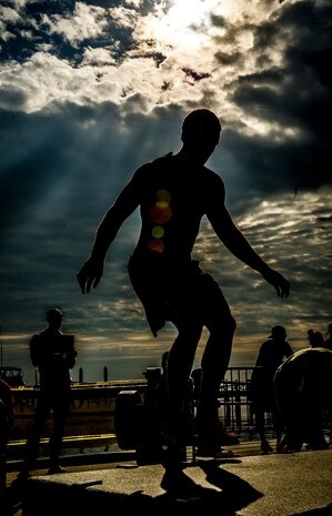 Staff Sgt. Ken Angel, 628th Contracting Squadron, performs box jumps during Integrity’s Revenge Oct. 6, 2012, at the Charleston Maritime Center, Charleston, S.C. Several members of Joint Base Charleston attended the two-day CrossFit event which included a Workout of the Day, to include box jumps, rowing, power clean with weights and rings. Several JB Charleston members finished in the top 10 of their divisions. (U.S. Air Force photo/ Senior Airman Dennis Sloan)