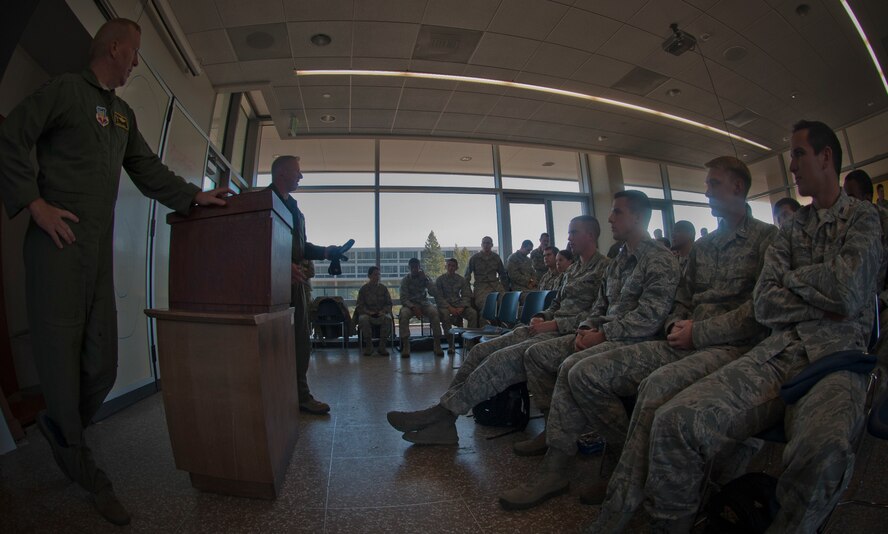 U.S. Air Force Col. Steven Ramer, 23d Wing vice commander, waits to speak to Cadet Squadron 9 during a visit at the U.S. Air Force Academy, Colo., Oct. 4, 2012. Members from the 23d WG traveled to the Academy to mentor cadets and answer questions about the operational Air Force. (U.S. Air Force photo by Senior Airman Nicholas Benroth/Released)