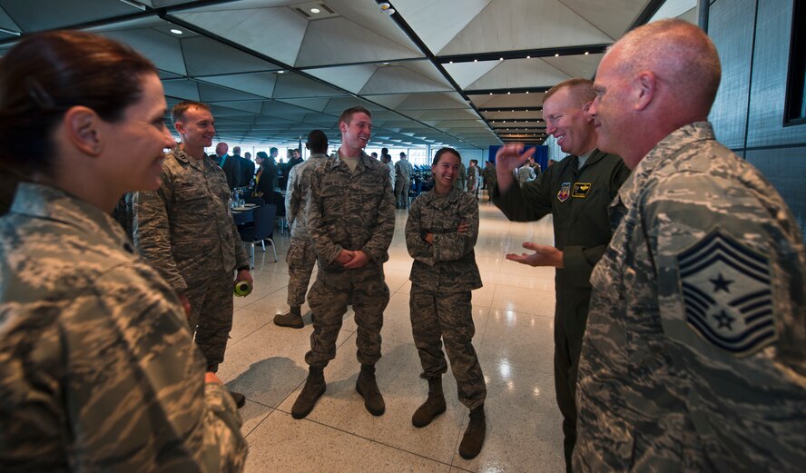 U.S. Air Force Col. Steven Ramer, 23d Wing vice commander, and Chief Master Sgt. Frank Batten, 23d WG command chief, socialize with cadets and other members of the 23d WG before lunch at the U.S. Air Force Academy, Colo., Oct. 4, 2012. The lunch at Mitchell Hall was just one stop as part of a multi-day event in which Airmen from Moody Air Force Base, Ga., mentored cadets. (U.S. Air Force photo by Senior Airman Nicholas Benroth/Released)