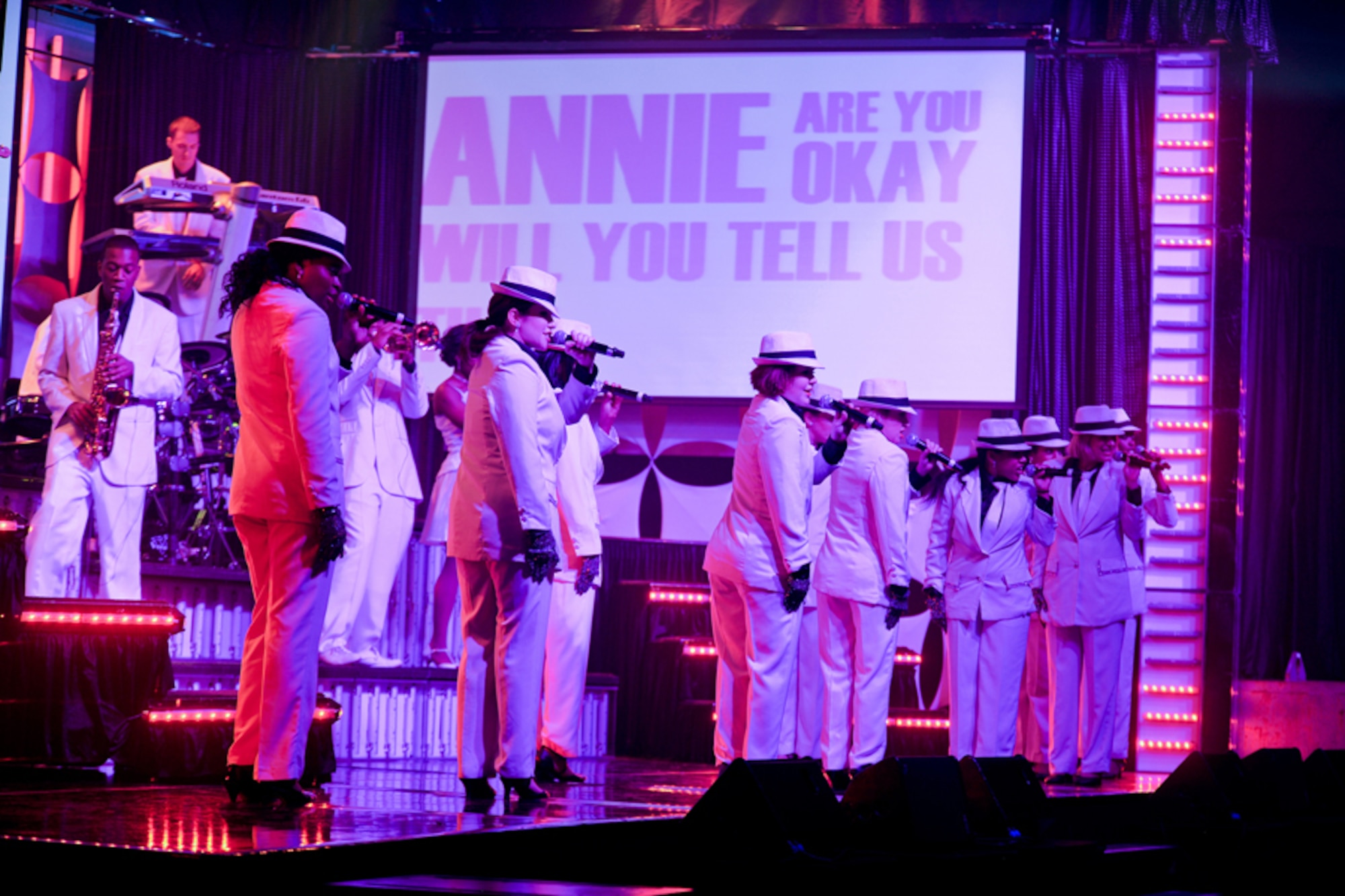 RAF FAIRFORD, United Kingdom – Members of the Tops In Blue 2012 World Tour perform Michael Jackson’s “Smooth Criminal” in Hangar 1205 at RAF Fairford Oct. 5. The group sang and danced for an audience of nearly 900 members of the local community. (U.S. Air Force photo by Staff Sgt. Brian Stives)