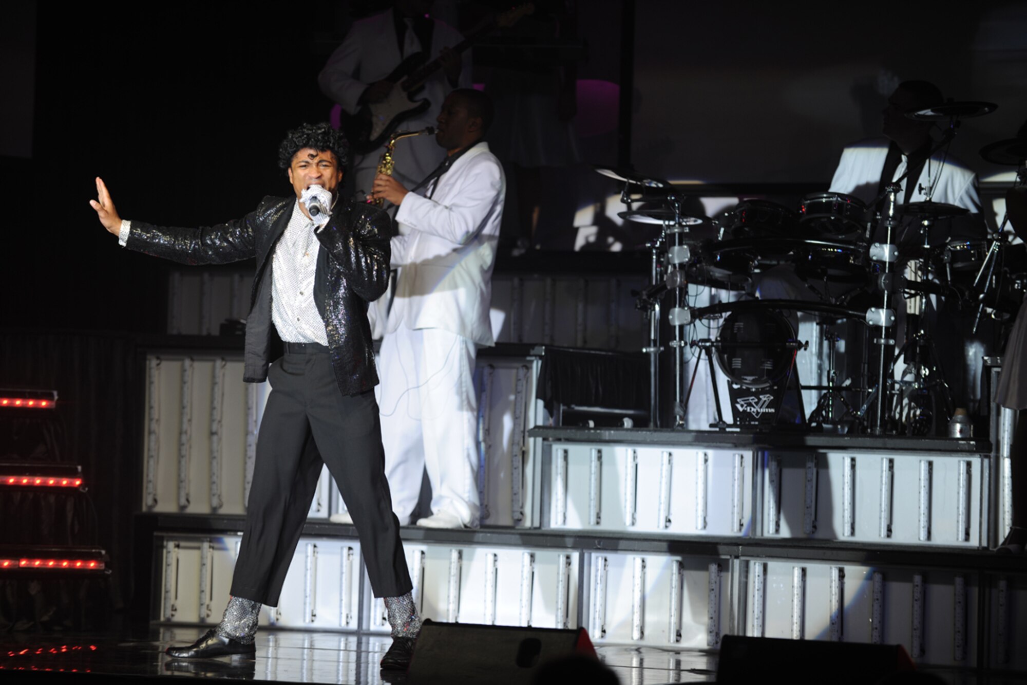 RAF CROUGHTON, United Kingdom – Senior Airman Charles Cooper performs as Michael Jackson during the Tops In Blue 2012 World Tour, “Listen,” at the RAF Croughton Fitness Center Oct. 4. Tops In Blue sang and danced for an audience of nearly 260 members of the 422nd Air Base Group and local community. (U.S. Air Force photo by Master Sgt. John Barton)