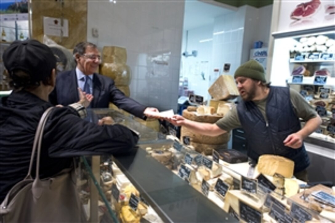 Defense Secretary Leon E. Panetta takes a sample of cheese at Eataly in New York, Oct. 11, 2012. Panetta was in New York to meet with the Time Life editorial board and deliver a speech on cybersecurity issues at the Business Executives for National Security meeting aboard the Intrepid Sea, Air & Space Museum, which showcases the World War II aircraft carrier USS Intrepid.
