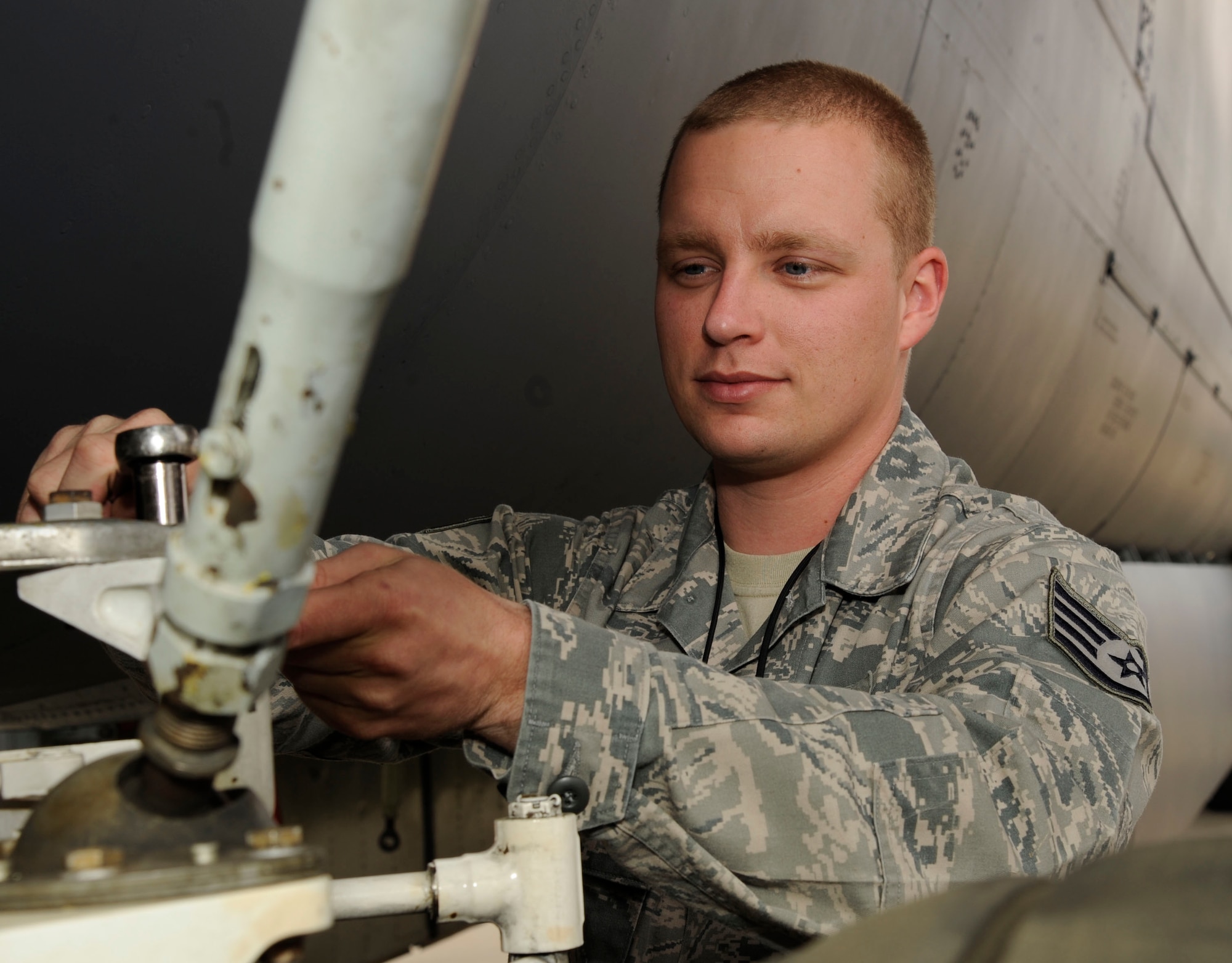 Staff Sgt. Joshua Crowe, 20th Aircraft Maintenance Unit hydraulics section, replaces a banana link on the main landing gear of a B-52H Stratofortress on Barksdale Air Force Base, La., Oct. 10. The flightline section of the hydraulics shop handles a much different sort of maintenance, such as red-ball, situations that occur during aircraft take-off that require immediate maintenance. (U.S. Air Force photo/Airman 1st Class Andrew Moua)(RELEASED)