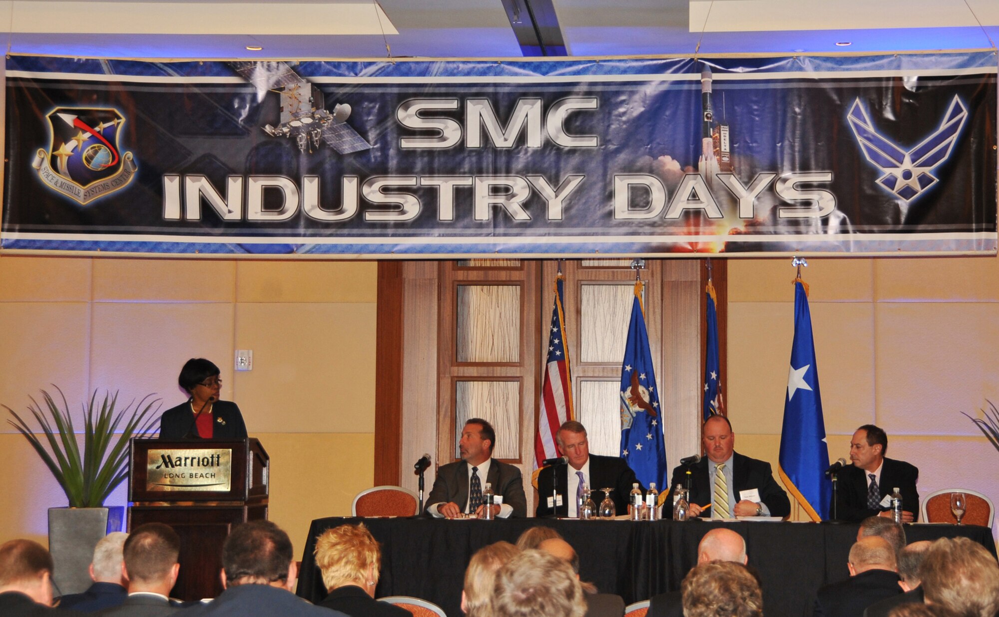 Doctor Wanda Austin, Aerospace Corporation president and CEO, moderates an industry panel discussion about meeting new challenges at SMC Industry Days, Oct. 3. Other panel members include Craig Cooning, Boeing Space and Intelligence Systems; Rick Ambrose, Lockheed Martin Space Systems Co.; Stan Dubyn, Millennium Space Systems; and Tom Wilson, ATK Space Division. (Photo by Sarah Corrice)