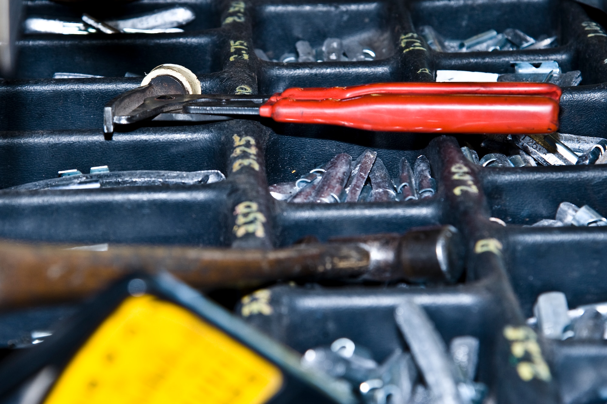 Various tools and bolts rest in an organizer on top of a toolbox at the base auto hobby shop at Hurlburt Field, Fla., Oct. 12, 2012. For many customers using the auto hobby shop offers a great cost savings over taking a vehicle to automotive repair shop. (U.S. Air Force photo/Airman 1st Class Michelle Vickers)
