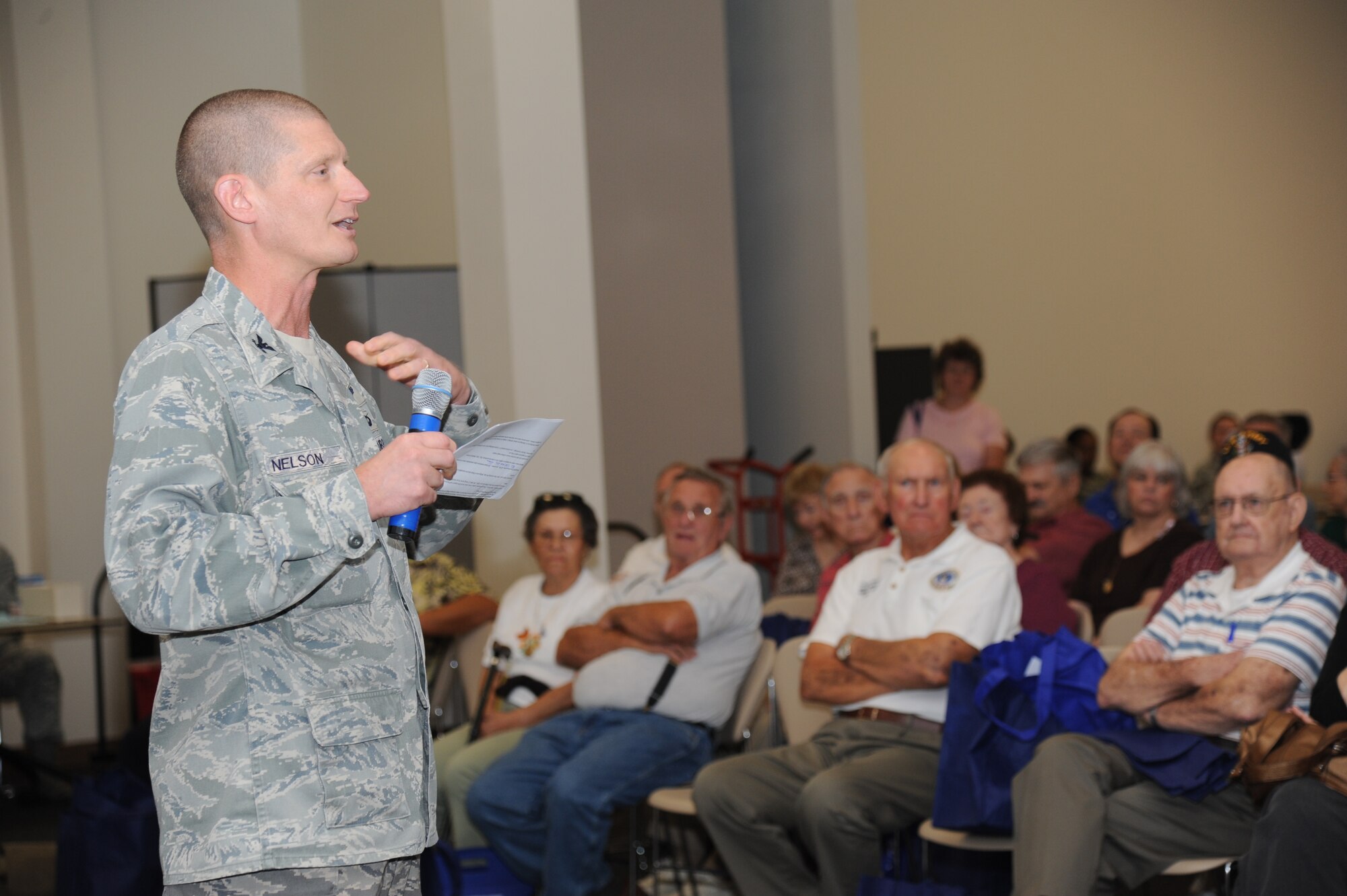 Col. Paul Nelson, 81st Aerospace Medicine Squadron, gives a briefing on medical care offered at the Keesler Hospital during the 81st Training Wing’s retiree appreciation day Oct. 12, 2012, at the Roberts Consolidated Aircraft Maintenance Facility, Keesler Air Force Base, Miss.  The event included information booths, guest speakers and lunch.  (U.S. Air Force photo by Kemberly Groue)