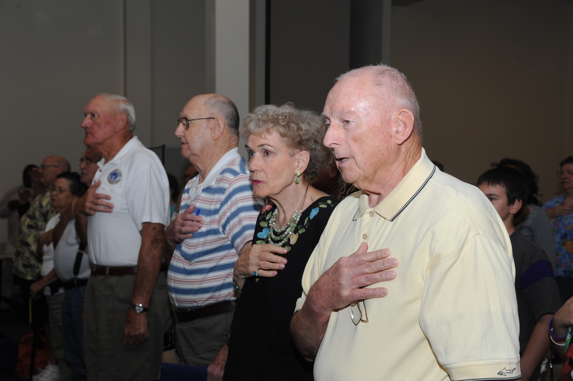 Jean and retired Chief Master Sgt. Jerry Caldwell of Biloxi, Miss., recite the Pledge of Allegiance during the 81st Training Wing’s retiree appreciation day Oct. 12, 2012, at the Roberts Consolidated Aircraft Maintenance Facility, Keesler Air Force Base, Miss.  The event included information booths, guest speakers and lunch.  (U.S. Air Force photo by Kemberly Groue)