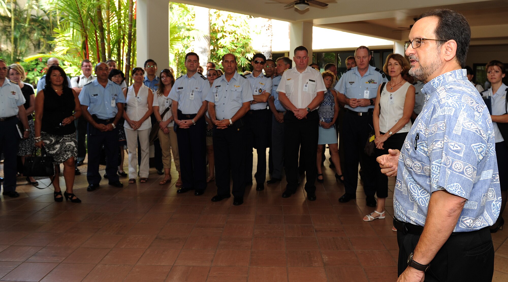 Steve Diamond, Pacific Air Forces historian, gives a tour to Gen. Herbert J. “Hawk” Carlisle, PACAF commander, Lt. Gen. Frank Gorenc, U.S. Air Force assistant vice chief of staff and foreign attaché corps leaders from around the world at the Courtyard of Heroes, Headquarters PACAF, Joint Base Pearl Harbor-Hickam, Hawaii, Oct. 9, 2012. Gorenc hosted the tour which to demonstrate to the foreign air attaché leaders and their spouses how the U.S. Air Force conducts business.  (U.S. Air Force Photo/Tech. Sgt. Jerome S. Tayborn/Released)