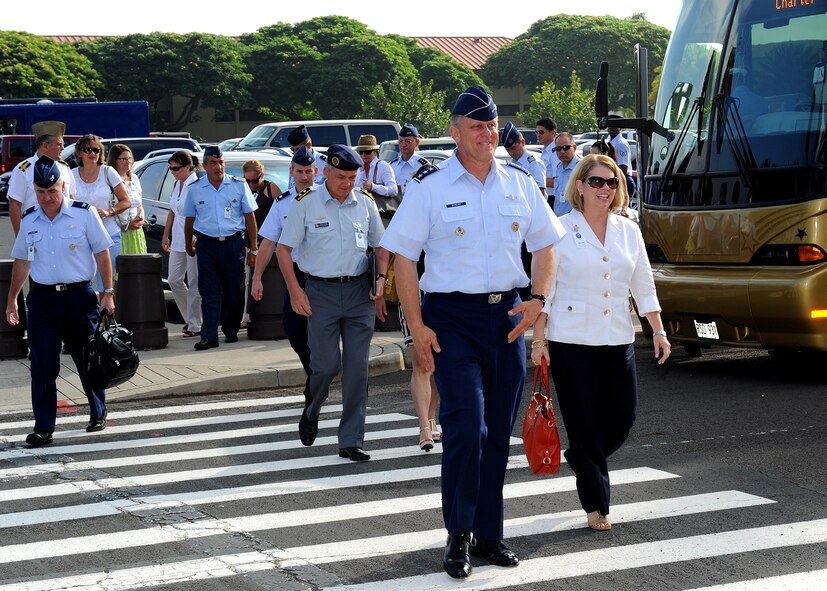 Lt. Gen. Frank Gorenc, U.S. Air Force assistant vice chief of staff, escorts foreign attaché corps leaders and their spouses to a meeting with Gen. Herbert J. “Hawk” Carlisle, PACAF commander, at the PACAF headquarters building, Joint Base Pearl Harbor-Hickam, Hawaii, Oct. 7, 2012.  Gorenc hosted the tour to demonstrate to the foreign air attaché leaders and their spouses how the U.S. Air Force conducts business.  (U.S. Air Force Photo/Tech. Sgt. Jerome S. Tayborn/Released)