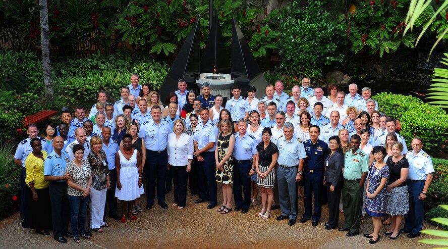 Lt. Gen. Frank Gorenc, U.S. Air Force assistant vice chief of staff; his spouse Sharon; Lt. Gen. Stanley T. Kresge, PACAF vice commander; and Mrs. Gillian Carlisle, spouse of Gen. Herbert J. “Hawk” Carlisle, PACAF commander, pose for a group photo with foreign attaché corps leaders from around the world in the Courtyard of Heroes at the PACAF Headquarters building at Joint Base Pearl Harbor-Hickam, Hawaii, Oct. 7, 2012.  Gorenc hosted the tour which to demonstrate to the foreign air attaché leaders and their spouses how the U.S. Air Force conducts business.  (U.S. Air Force Photo/Tech. Sgt. Jerome S. Tayborn/Released)