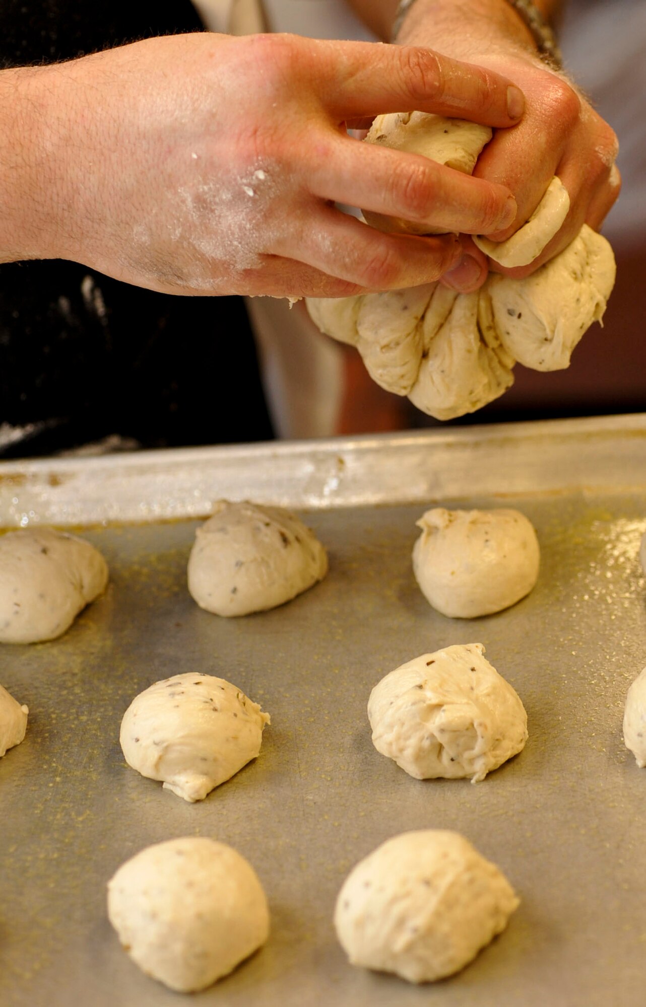 Tim Cooper, Fort Eustis Club executive chef, prepares bread dough at the club's kitchen at Fort Eustis, Va., Oct. 10, 2012. Cooper and his team make every dish served at the club from scratch each day. (U.S. Air Force photo by Staff Sgt. Wesley Farnsworth/Released)