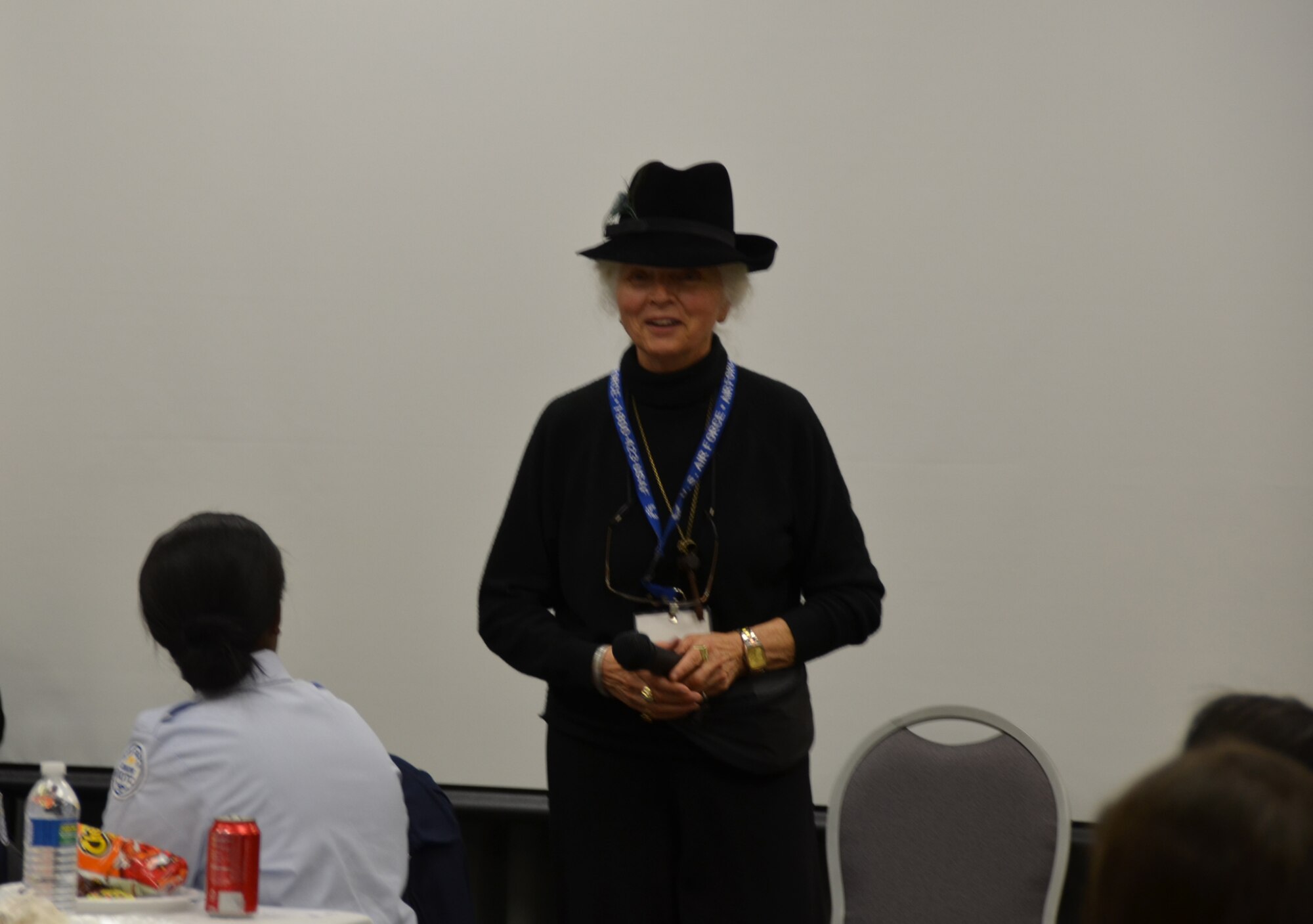 WRIGHT-PATTERSON AIR FORCE BASE, Ohio - Rhea Woltman, one of the 13 women pilots known as the First Lady Astronaut Trainees (later known as the Mercury 13) that were selected to undergo the same testing program as the Mercury astronauts, shares her memories and experiences of the program to more than 60 attendees of the Sixth Annual Wings of Women Conference Oct. 5, 2012. The guests enjoyed the afternoon at the 445th Airlift Wing listening to guest speakers, touring a 445th AW C-17 Globemaster III and watching the 445th Aeromedical Evacuation Squadron perform a demonstration. (U.S. Air Force photo/Lt. Col. Cynthia Harris)