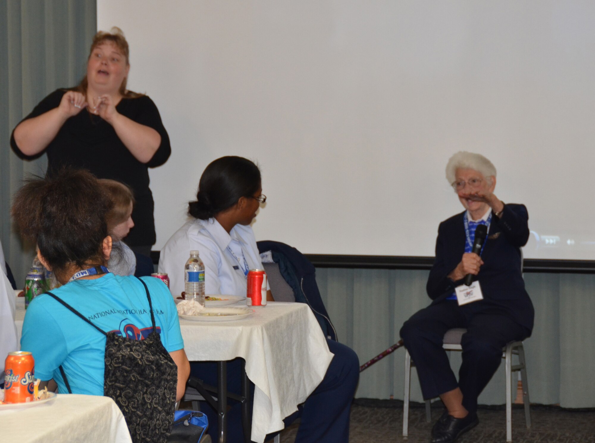 WRIGHT-PATTERSON AIR FORCE BASE, Ohio - Nadine Nagle, World War II Women Airforce Service Pilots (WASP), shares her memories of serving as a WASP to more than 60 attendees of the Sixth Annual Wings of Women Conference Oct. 5, 2012. The guests enjoyed the afternoon at the 445th Airlift Wing listening to guest speakers, touring a 445th AW C-17 Globemaster III and watching the 445th Aeromedical Evacuation Squadron perform a demonstration. (U.S. Air Force photo/Lt. Col. Cynthia Harris)