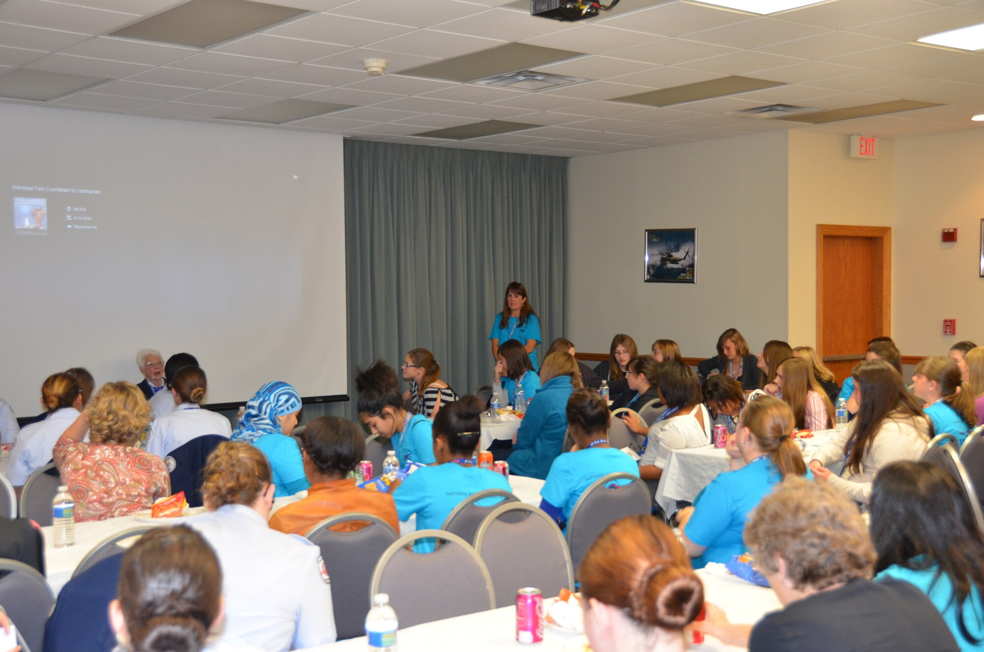 WRIGHT-PATTERSON AIR FORCE BASE, Ohio - More than 60 attendees of the Sixth Annual Wings of Women Conference held here Oct. 5, 2012, listen to Nadine Nagle, World War II Women Airforce Service Pilots (WASP), share her memories of serving as a WASP. The guests enjoyed the afternoon at the 445th Airlift Wing listening to guest speakers, touring a 445th AW C-17 Globemaster III and watching the 445th Aeromedical Evacuation Squadron perform a demonstration. (U.S. Air Force photo/Lt. Col. Cynthia Harris)