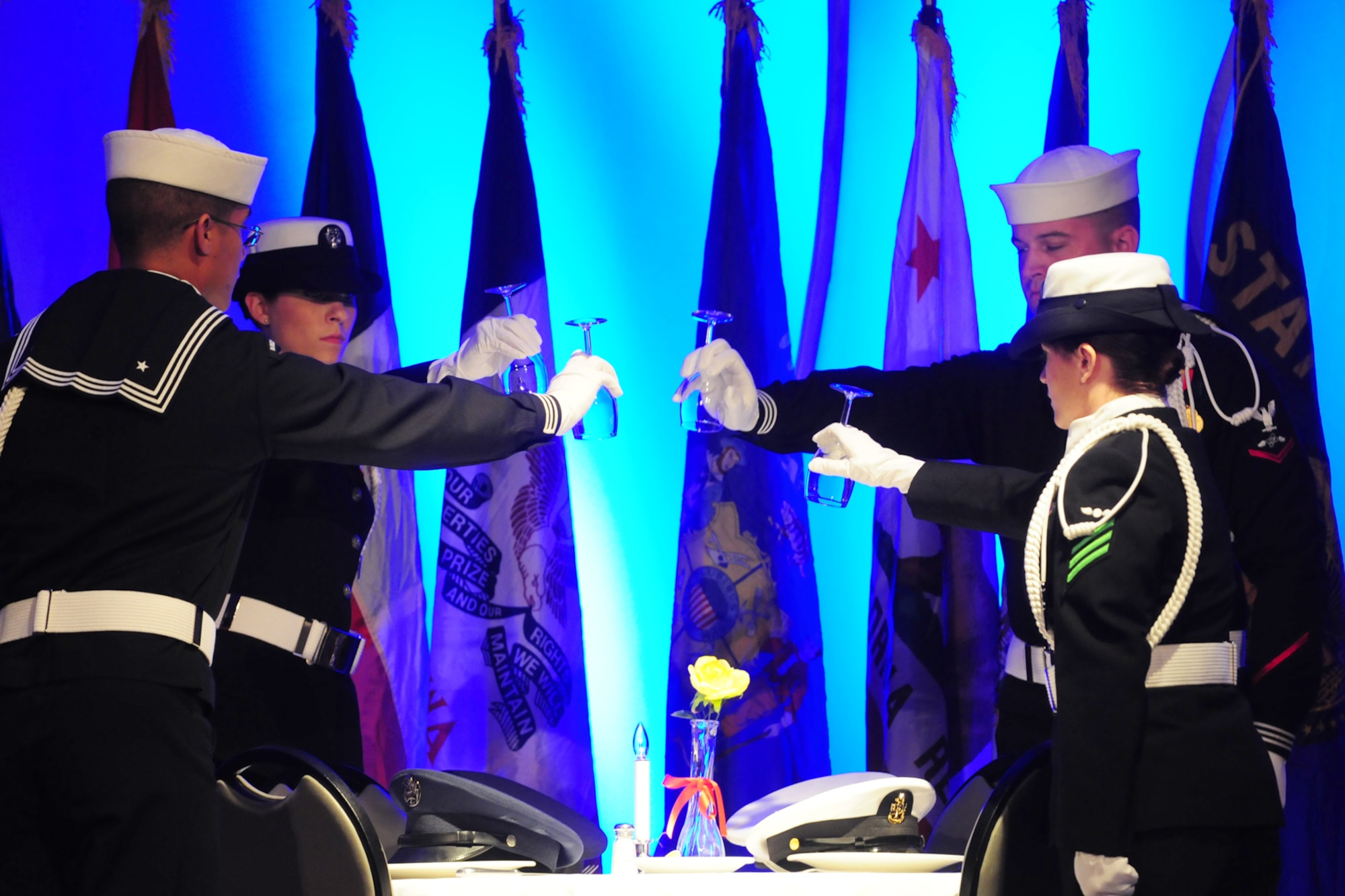 Members of the Navy Honor Guard pay tribute to prisoners of war and those missing in action during the Navy Ball Oct. 5 at the National Cowboy and Western Heritage Museum in Oklahoma City. (Air Force photo by Kelly White)
