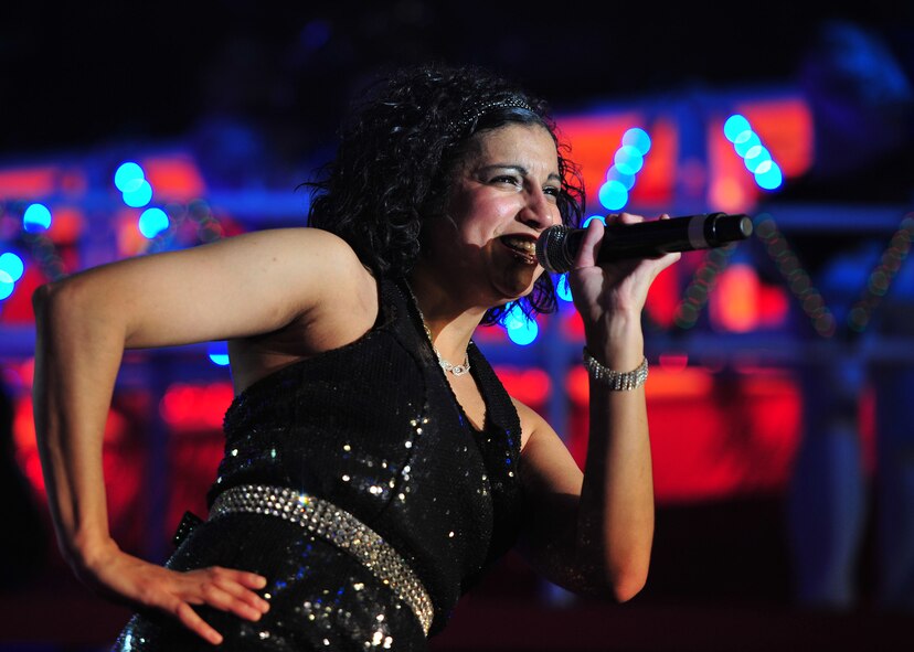 Staff Sgt. Abigail Foster, 92nd Maintenance Squadron, uses singing to overcome obstacles in her life. Foster has recovered from two brain surgeries and still continues to serve in the Air Force and perform locally. (U.S. Air Force photos/Airman 1st Class Ryan Zeski) 

