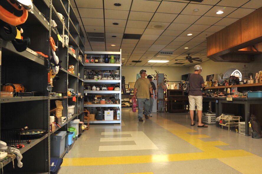 Thrift shoppers look for “that certain something” Oct. 3 at the thrift store in Bldg. 750. The thrift store has a half-price sale twice a year on thrift shop property only (second week in January and June).  (U.S. Air Force photo by Senior Airman Sandra Welch)