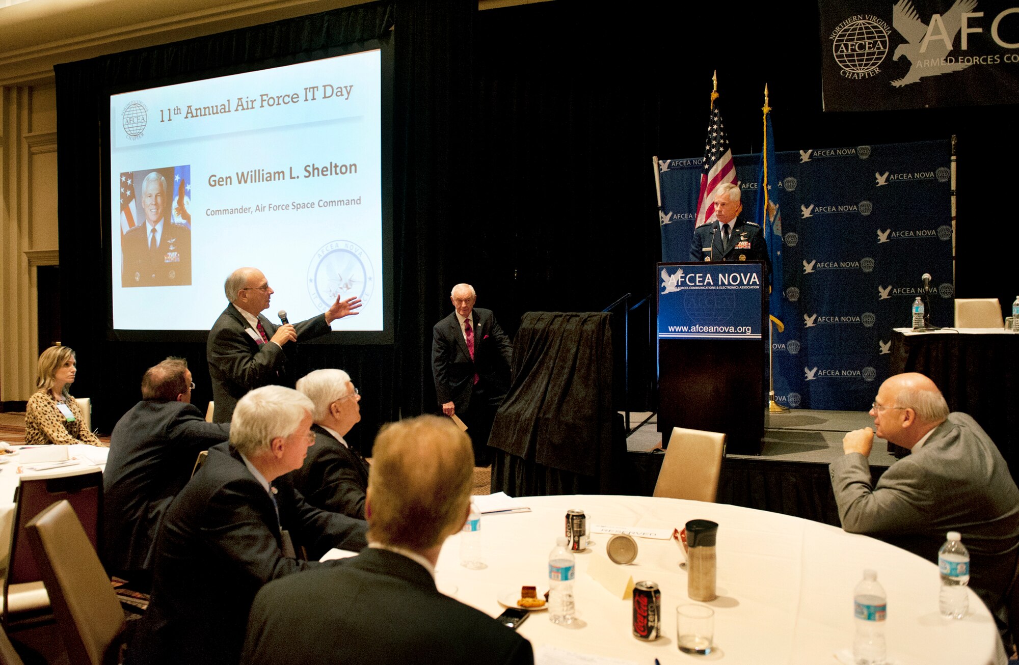 Gen. William L. Shelton, center, commander of the Air Force Space Command, listens as an attendee asks a question during the 11th Annual Air Force IT Day at Tyson's Corner, Va., Oct. 11, 2012. The event is an anual one-day conference focused on issues and challenges facing the future Air Force.(U.S. Air Force photo/Val Gempis)
