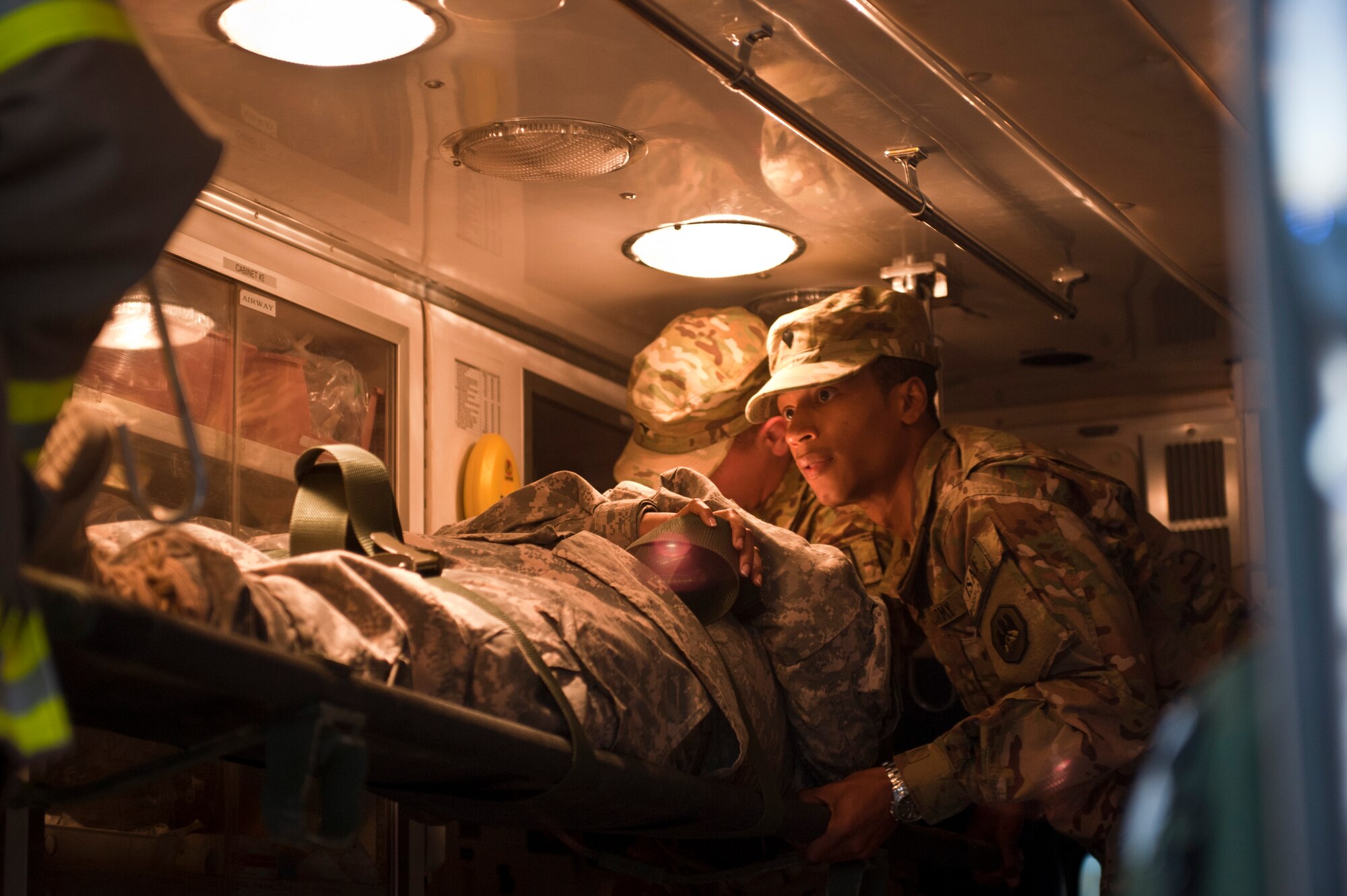 Soldiers load a simulated patient onto an ambulance during an emergency response exercise at Bagram Airfield, Afghanistan, Oct. 12, 2012. The exercise was designed to test Bagram’s first responders and emergency managers in order to maintain readiness for potential real-world crises on base. (U.S. Air Force photo/Capt. Raymond Geoffroy)