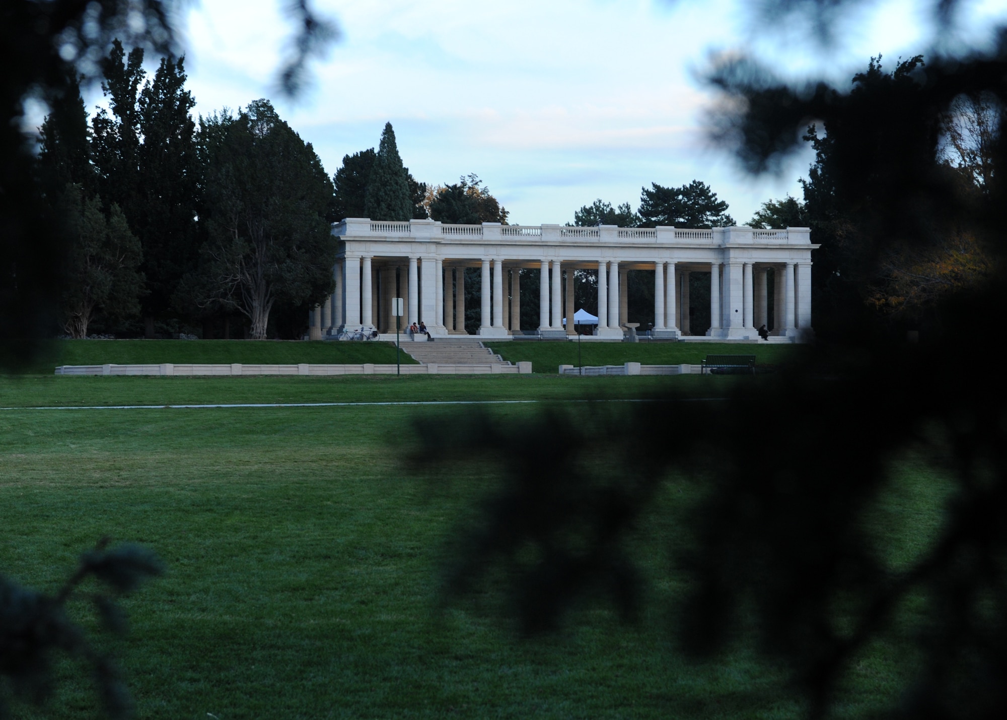 DENVER, Colo. – The sun begins to set over the pavilion in Cheesman Park Oct. 11, 2012. The park is a scenic getaway from the hustle and bustle of the city, but 2,000 bodies still remain buried from when Cheesman Park was Mount Prospect Cemetery. (U.S. Air Force photo by Senior Airman Marcy Glass)
