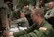 Lt. Gen. Thomas Travis, U.S. Air Force Surgeon General, turns the keys during a simulated launch in the 90th Operations Support Squadron’s missile procedures trainer Oct. 4. Capt. Paul Comaroto, 90th OSS, coached Travis as 1st Lt. Ian Gunther, 90th Operations Group, turned the second set of keys. Accompanying Travis on his visit to the MPT was Col. Christopher Coffelt, 90th Missile Wing Commander, Chief Master Sgt. Michael Garrou, 90 MW command chief and, far right, Chief Master Sgt. Kevin Lambing, chief medical enlisted force. (U.S. Air Force photo by R.J. Oriez)