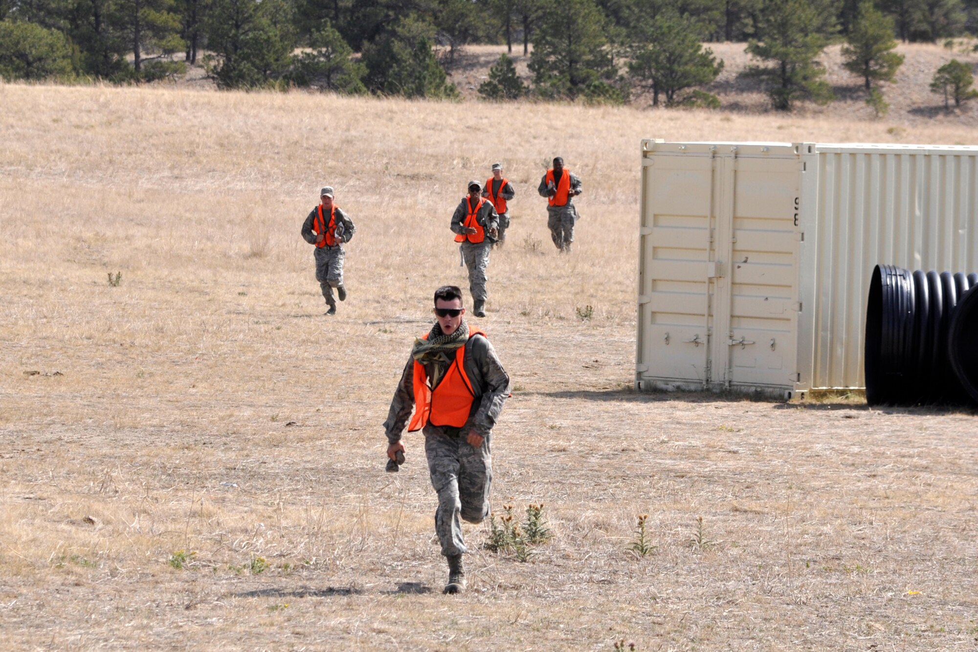 Members of the 307th Security Forces Squadron from Barksdale Air Force Base, La., compete in the 2012 annual Global Strike Challenge at Camp Guernsey, Wyo., Sept. 26. 2012. A team of six Airmen and one alternate were allowed to compete from missile and bomb wings throughout the Air Force Global Strike Command. The Airmen were tested in three categories; tactics, firing and mental and physical challenge. (U.S. Air Force photo by Col. Kevin Wolfe/Released)