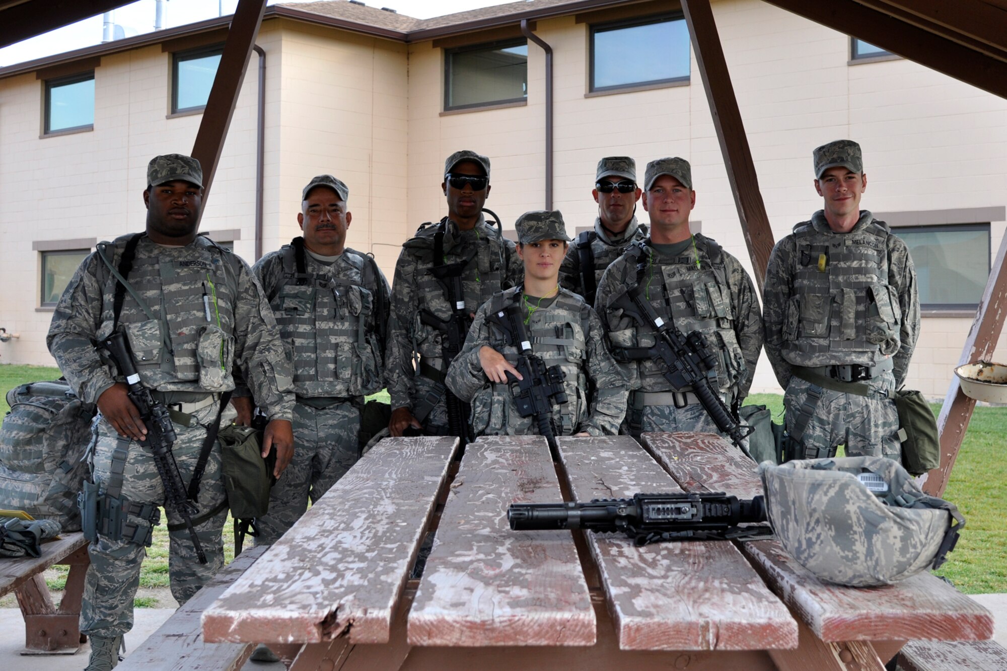 Senior Airman Gregory Anderson, Tech. Sgt. David Fuselier, Senior Airman Stephen D. Boyd Jr., Airman 1st Class Kellie Anne Morrow, Senior Airman Randy Patrick, Staff Sgt. Johnathan Maupin, and Senior Airman Clint Melancon, pose for a group photo at Camp Guernsey, Wyo., Sept. 25. 2012. The Airmen, who are assigned to the 307th Security Forces Squadron at Barksdale Air Force Base, La., were in Wyoming to compete in the 2012 annual Global Strike Challenge. (U.S. Air Force photo by Col. Kevin Wolfe/Released) 
