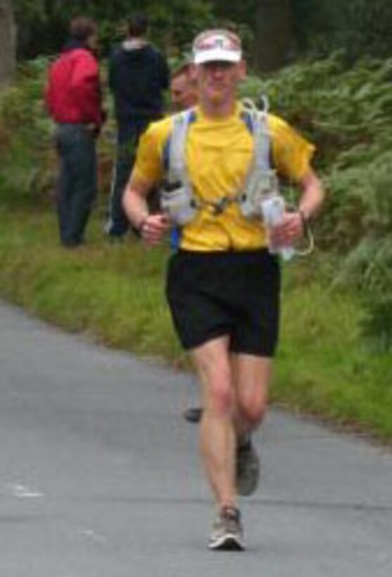 Lt. Col. Chris Bennett, 100th Operations Support Squadron commander at Royal Air Force Station Mildenhall, England, makes his way along country roads between London and Brighton during an ultra-marathon on Sept. 30, 2012. The ultra-marathon was 61.2 miles and participants had to find their own way to the finish line aided by a map and compass. (Courtesy photo by Molly Bennett) 