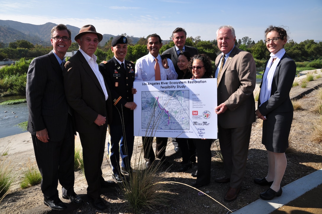 Los Angeles Mayor Antonio Villaraigosa, left center, poses with key partners around a map of the U.S. Army Corps of Engineers Los Angeles District’s Ecosystem Restoration Feasibility Study at North Atwater Park Oct. 9. From the left are; City Engineer Gary Lee Moore, Friends of the LA River founder Lewis MacAdams, Los Angeles District Commander Col. Mark Toy, Director of the Los Angeles City Bureau of Sanitation Enrique Zaldivar, Miss Me company spokesperson Lilly Kim, Chairperson of the White House Council on Environmental Quality Nancy Sutley, Councilmember Tom LaBonge and the District's Chief of Planning Division Dr. Josephine Axt.