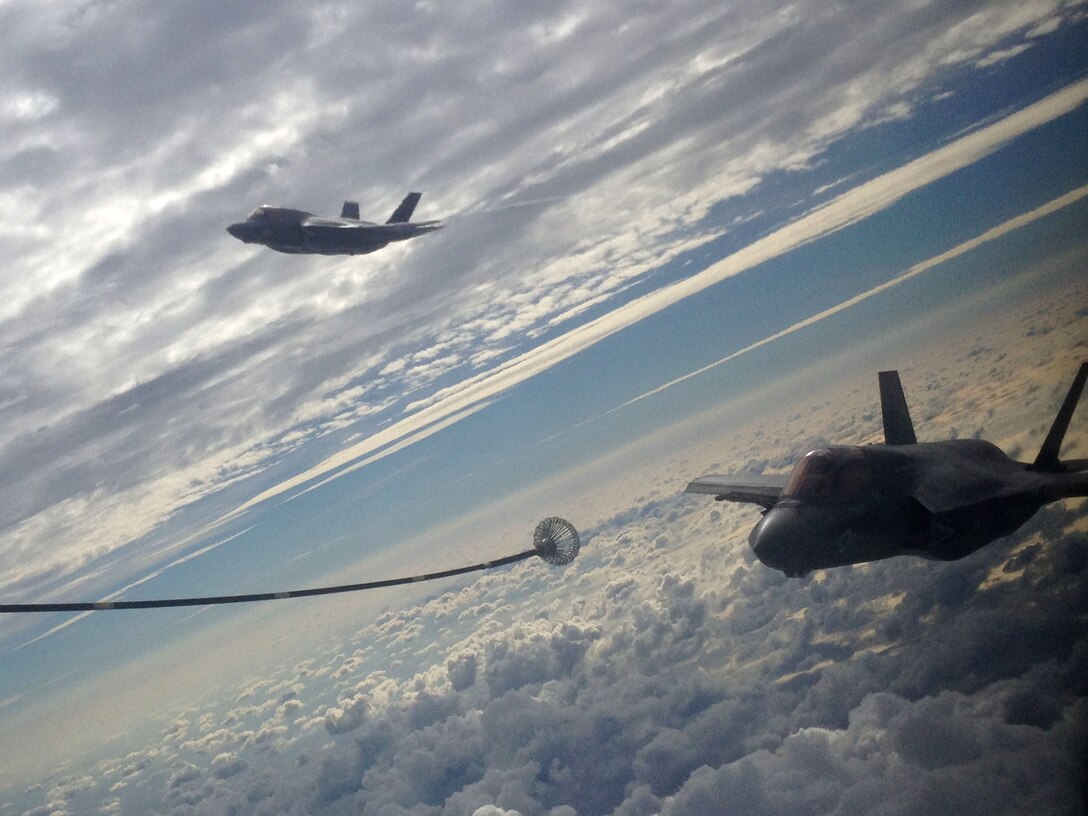 F-35B Joint Strike Fighters with Marine Fighter Attack Training Squadron 501 conduct aerial refueler training with a KC-130J Hercules with Marine Aerial Refueler Transport Squadron 252 Oct. 2in the sky near Eglin Air Force Base, Fla. It was the first time an operational Joint Strike Fighter had conducted air-to-air refueling. 