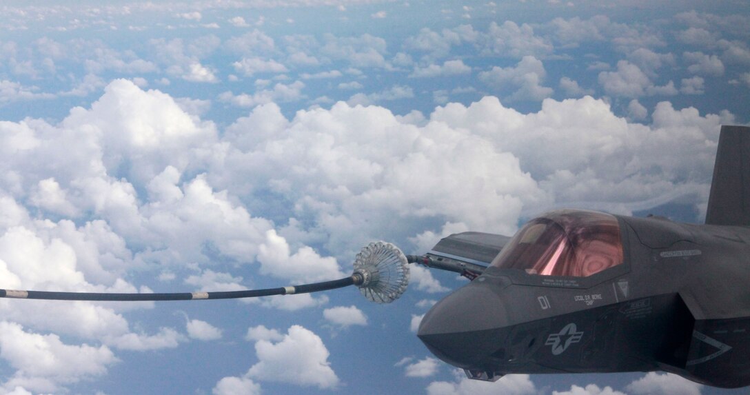 F-35B Joint Strike Fighters with Marine Fighter Attack Training Squadron 501 conduct aerial refueler training with a KC-130J Hercules with Marine Aerial Refueler Transport Squadron 252 Oct. 2in the sky near Eglin Air Force Base, Fla. It was the first time an operational Joint Strike Fighter had conducted air-to-air refueling. 