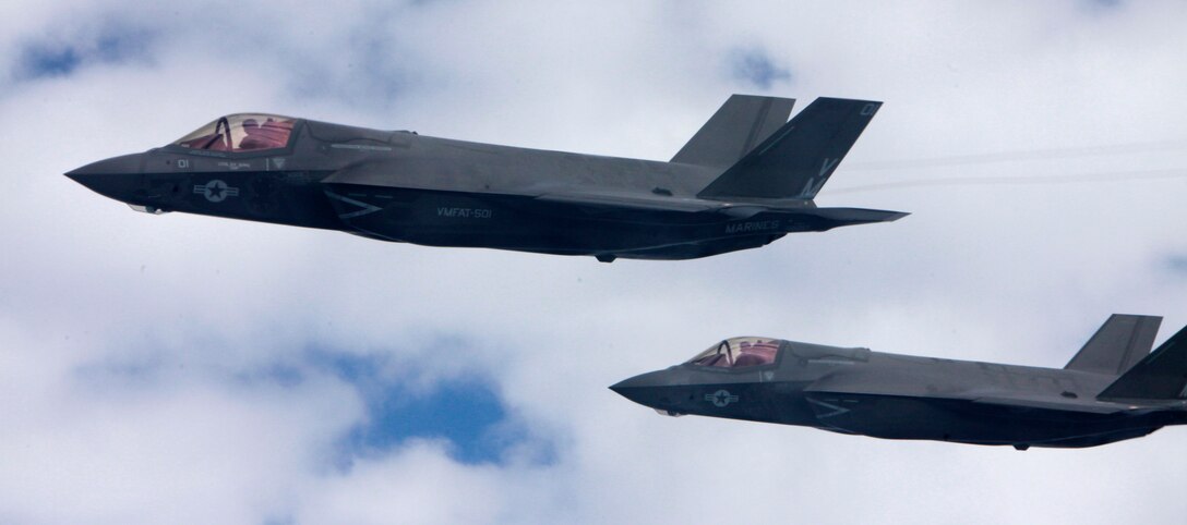 F-35B Joint Strike Fighters with Marine Fighter Attack Training Squadron 501 conduct aerial refueler training with a KC-130J Hercules with Marine Aerial Refueler Transport Squadron 252 Oct. 2in the sky near Eglin Air Force Base, Fla. It was the first time an operational Joint Strike Fighter had conducted air-to-air refueling. 