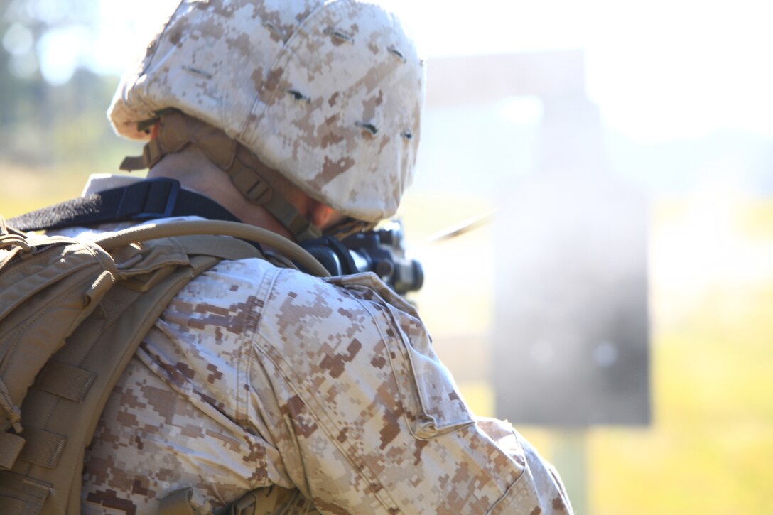 A Marine with Engineer Company, Combat Logistics Regiment 2, 2nd Marine Logistics Group fires on man-shaped targets during the unit’s pre-deployment training at Camp Devil Dog, N.C., Oct. 11, 2012. The Marines brushed up on their shooting techniques by practicing speed reloading and precision shooting in preparation for their upcoming deployment to Afghanistan. 