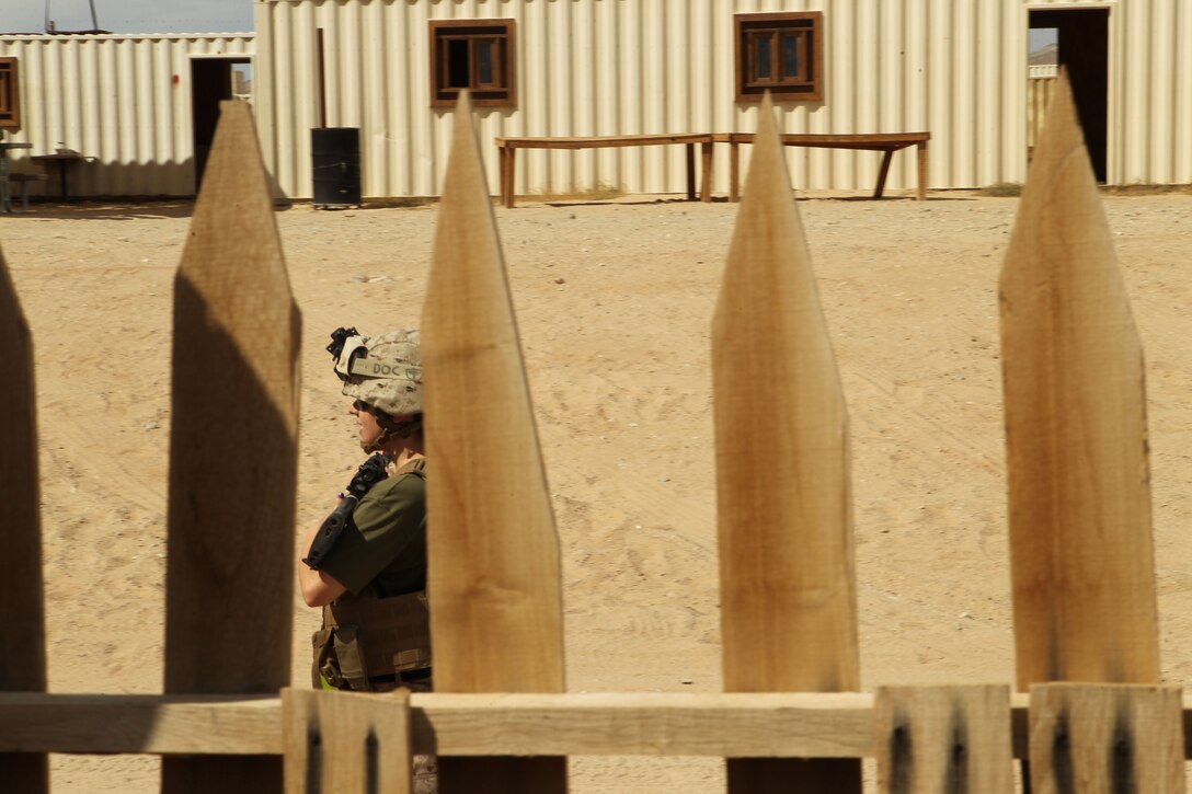 A wife of a Marine in Combat Logistics Battalion 7 patrols through a Military Opperations on Urban Terrain town during CLB-7’s Jane Wayne Day aboard the Combat Center Wednesday at Range 215. Jane Wayne Day allows loved ones and spouses to get an in-depth perspective of their Marine’s day-to-day life. (U.S. Marine Corps photo by Lance Cpl. Lauren Kurkimilis)