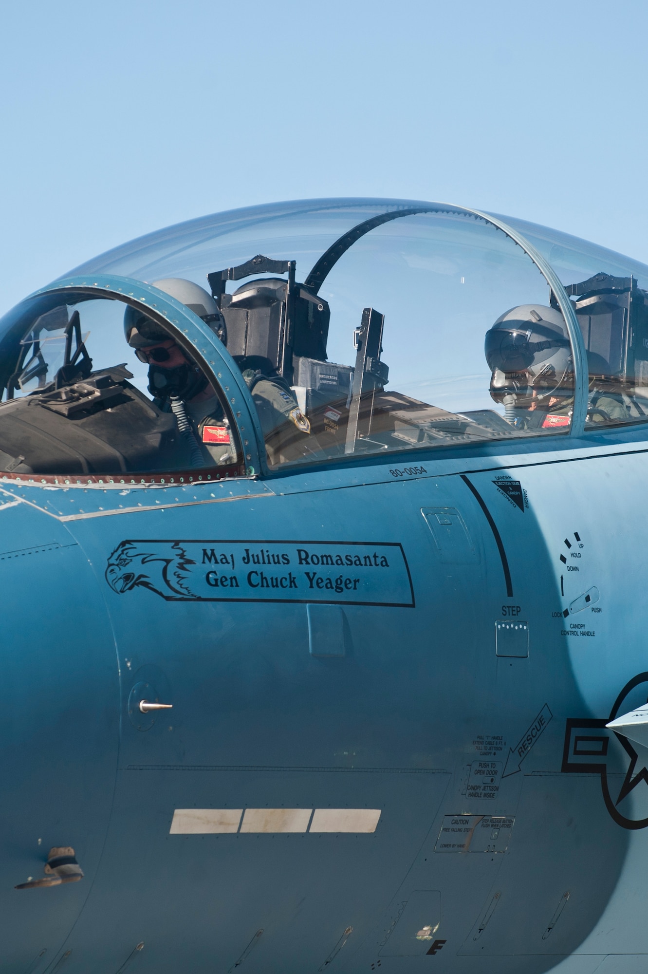 Capt. David Vincent, 65th Aggressor Squadron pilot, and retired United States Air Force Brig. Gen. Charles E. "Chuck" Yeager wait for end-of-runway inspections to be completed Oct. 14, 2012, at Nellis Air Force Base, Nev. Yeager was here to commemorate the 65th anniversary of his breaking of the sound barrier in a Bell X-1 rocket research plane over Edwards Air Force Base, Calif., at 10:24 a.m. Oct. 14, 1947. (U.S. Air Force photo by Airman 1st Class Jason Couillard)